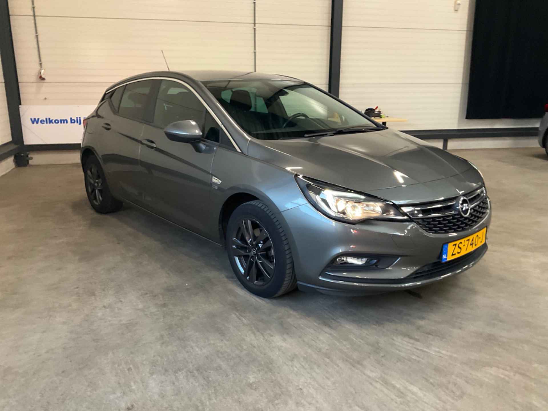 Opel Astra 1.0 Turbo 120 Jaar Edition | Airco | Cruise Control | Navigatie | PDC V+A | Trekhaak | - 4/9