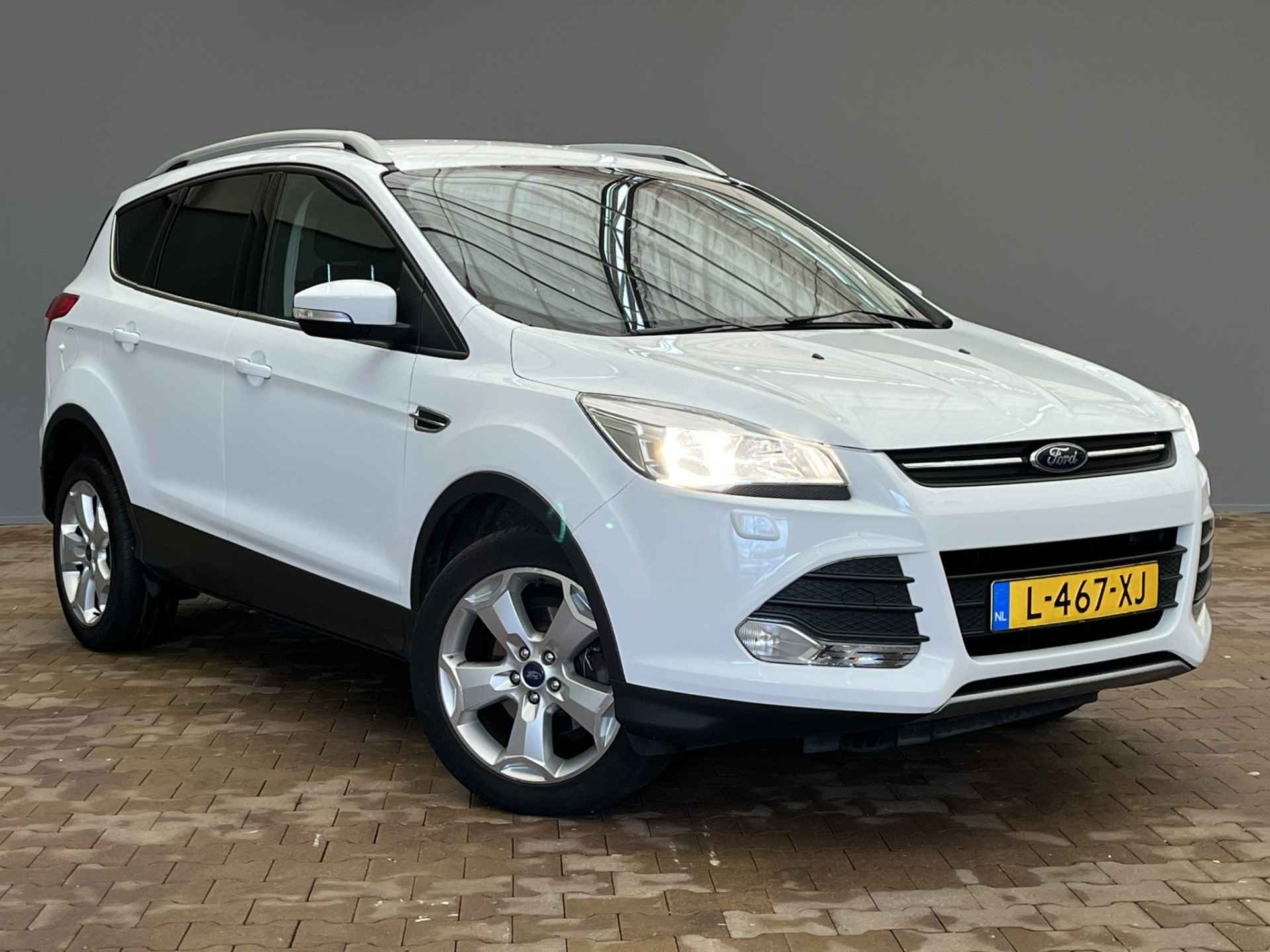 Ford Kuga 1.6 150PK Titanium | Stoelverwarming | Airco | Cruise | 17" Lichtmetaal | Bluetooth | Parkeersensoren - 16/32