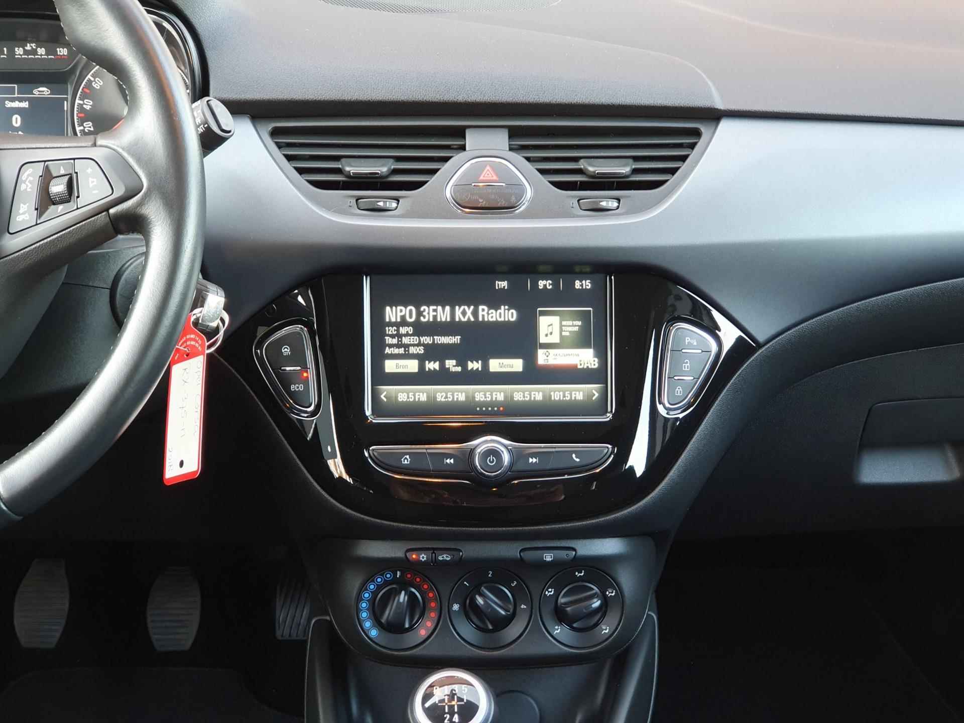 Opel Corsa 1.4 Favourite 90PK 5drs airco, cruise, navi, pdc, lmv, bluetooth, carplay RIJKLAAR - 11/19