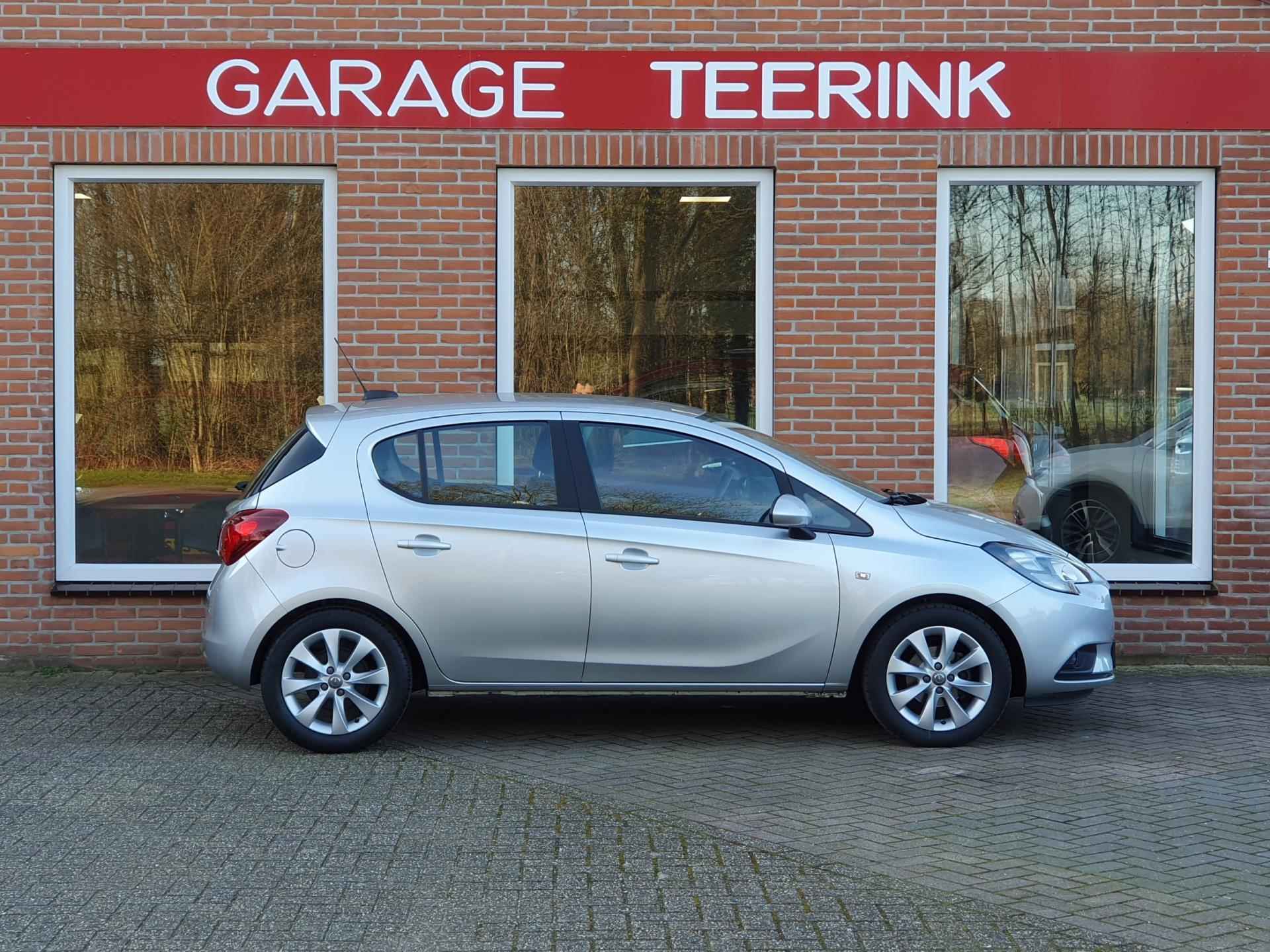 Opel Corsa 1.4 Favourite 90PK 5drs airco, cruise, navi, pdc, lmv, bluetooth, carplay RIJKLAAR - 17/19