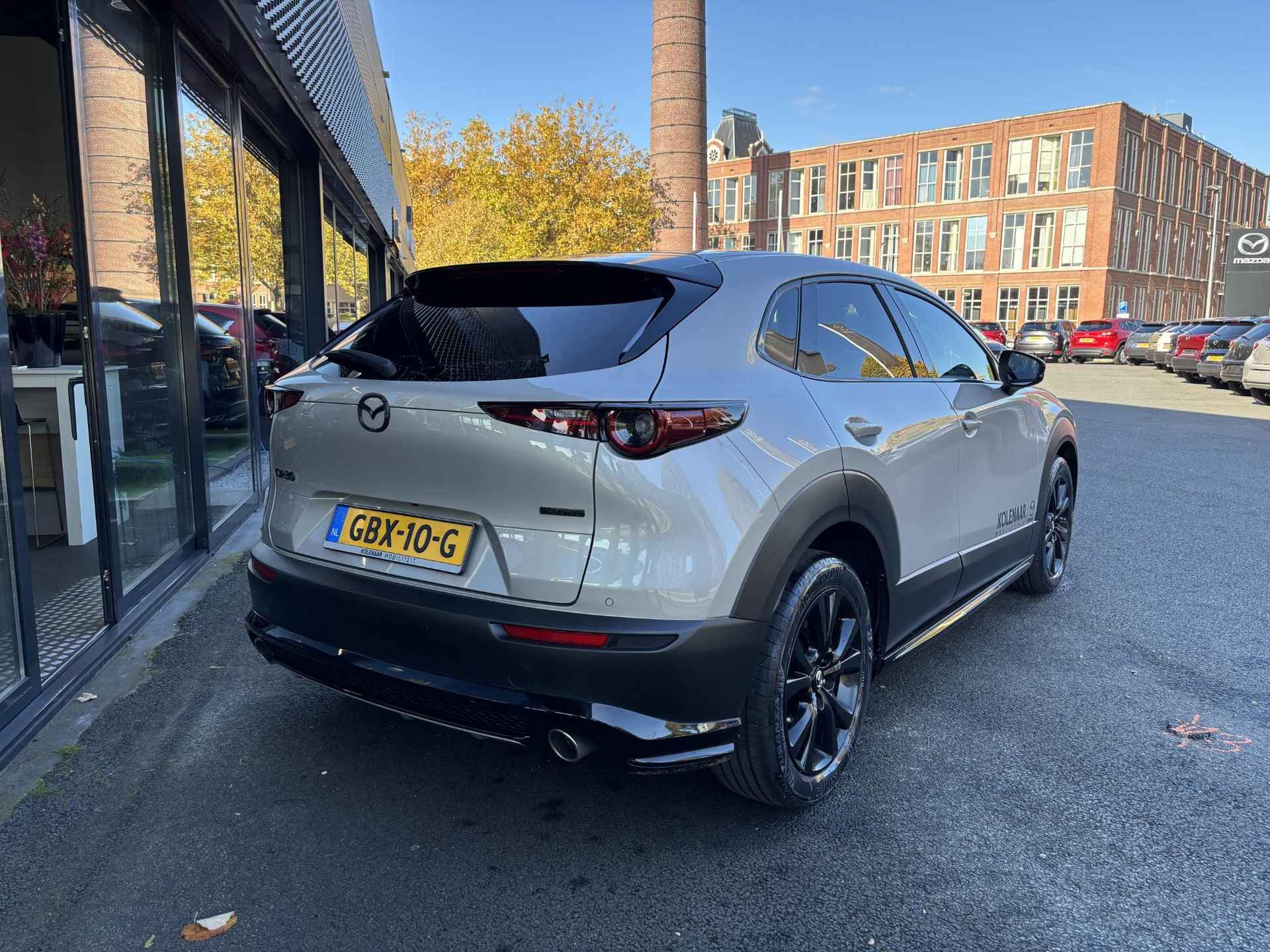 Mazda CX-30 Homura Black Edition - 2.0 e-Sky-G 150 Automaat /1e eigenaar/Dealeronderhouden/Navi/ECC/Adaptive/HUD/Keyless/CarPlay - 7/38