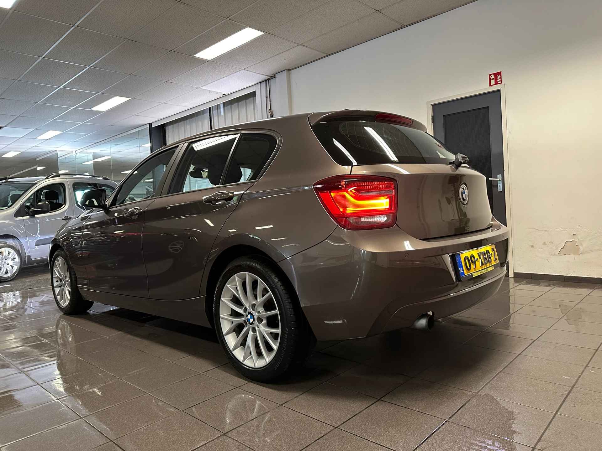 BMW 1-serie 116i Business+ * Automaat / 1e Eig / Navigatie / Xenon / Leder / NL Auto * - 3/23