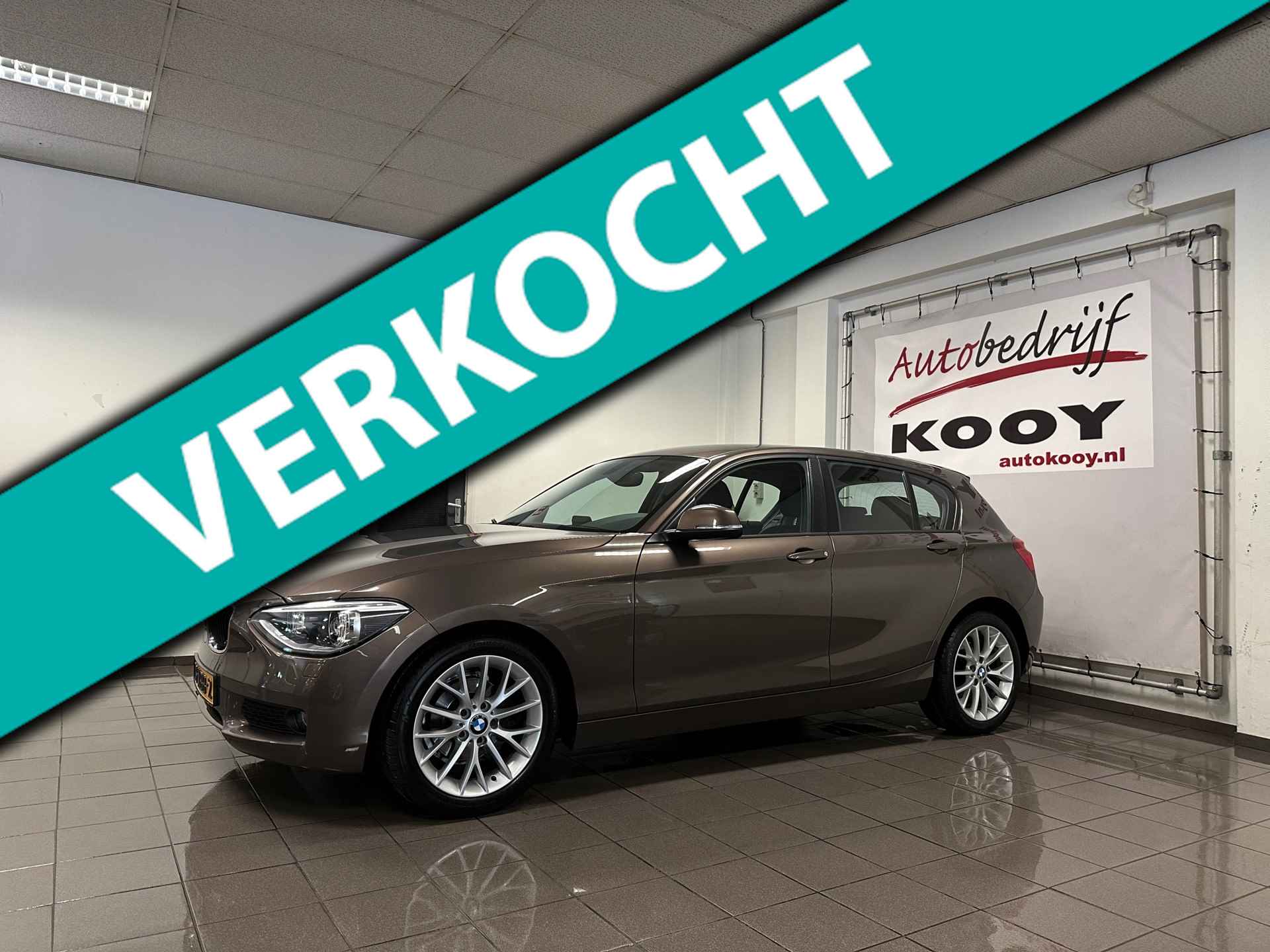 BMW 1-serie 116i Business+ * Automaat / 1e Eig / Navigatie / Xenon / Leder / NL Auto * - 1/23