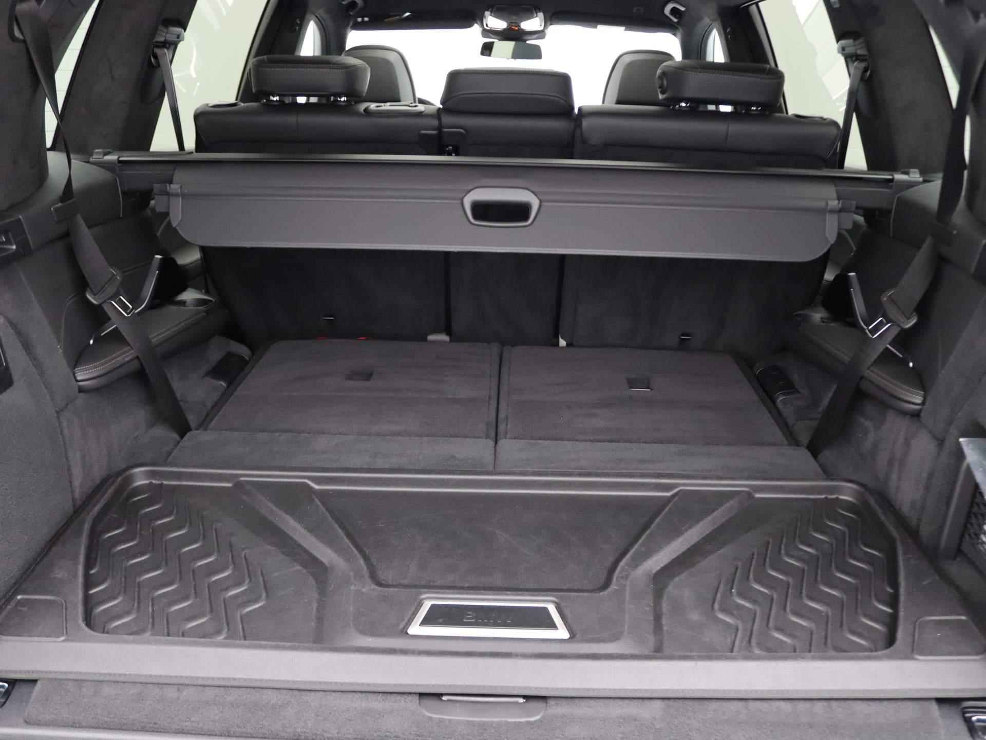 BMW X7 xDrive40d High Executive | M Sportpakket Pro | Trekhaak | Panoramadak | Stoelventilatie | Driving Assistant Professional | Harman Kardon | 22'' - 13/38