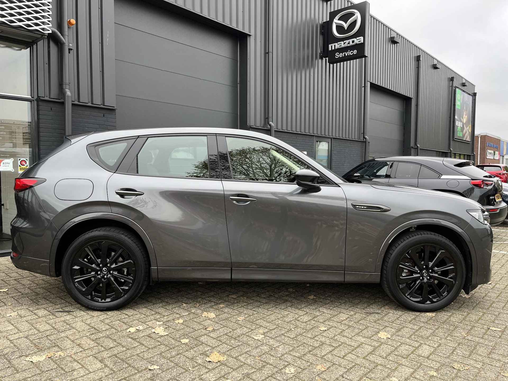 Mazda CX-60 Homura 2.5 e-Sky PHEV 327 AWD Automaat /Dealeronderhouden/Navi/HUD/Keyless/ECC/Leder/CarPlay - 8/27