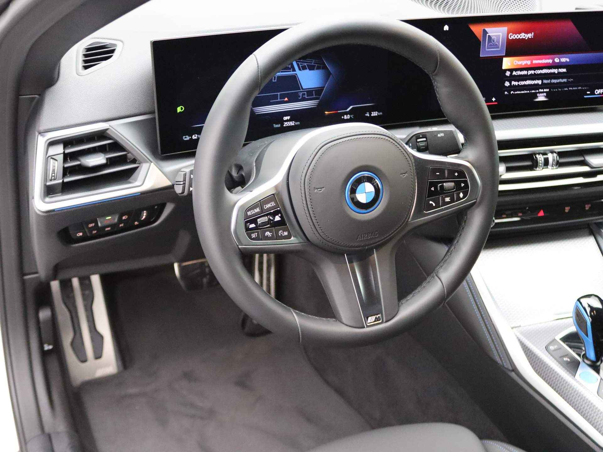 BMW i4 Gran Coupé eDrive35 70 kWh M Sportpakket / Curved Screen / Fast Charger / Park. Camera / 18" - 10/34