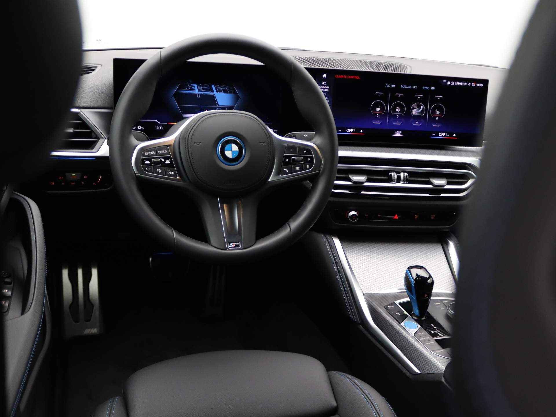 BMW i4 Gran Coupé eDrive35 70 kWh M Sportpakket / Curved Screen / Fast Charger / Park. Camera / 18" - 27/34