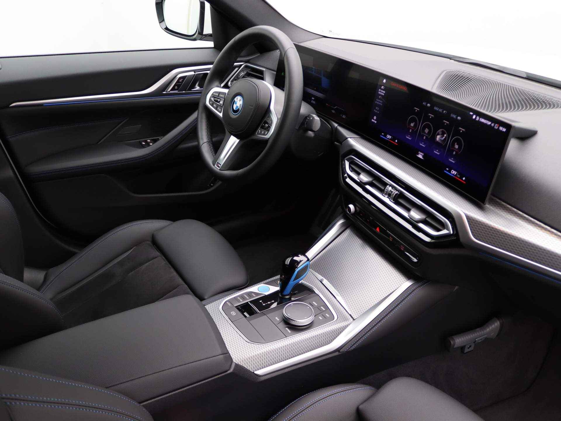 BMW i4 Gran Coupé eDrive35 70 kWh M Sportpakket / Curved Screen / Fast Charger / Park. Camera / 18" - 33/34