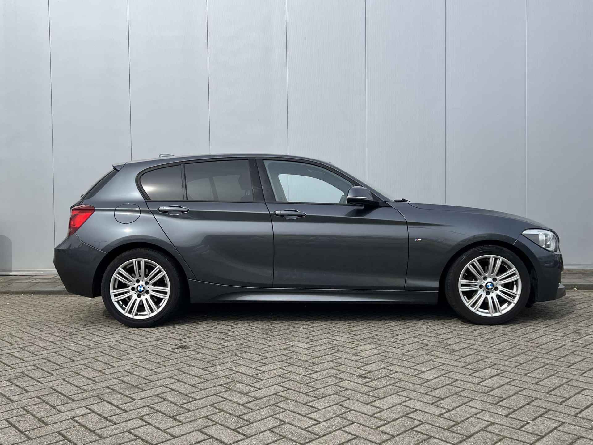 BMW 1-serie 116i High Executive Automaat | M-Pakket | Xenon Koplampen | Lederen bekleding | Stoelverwarming | 12 maanden garantie! | - 4/33