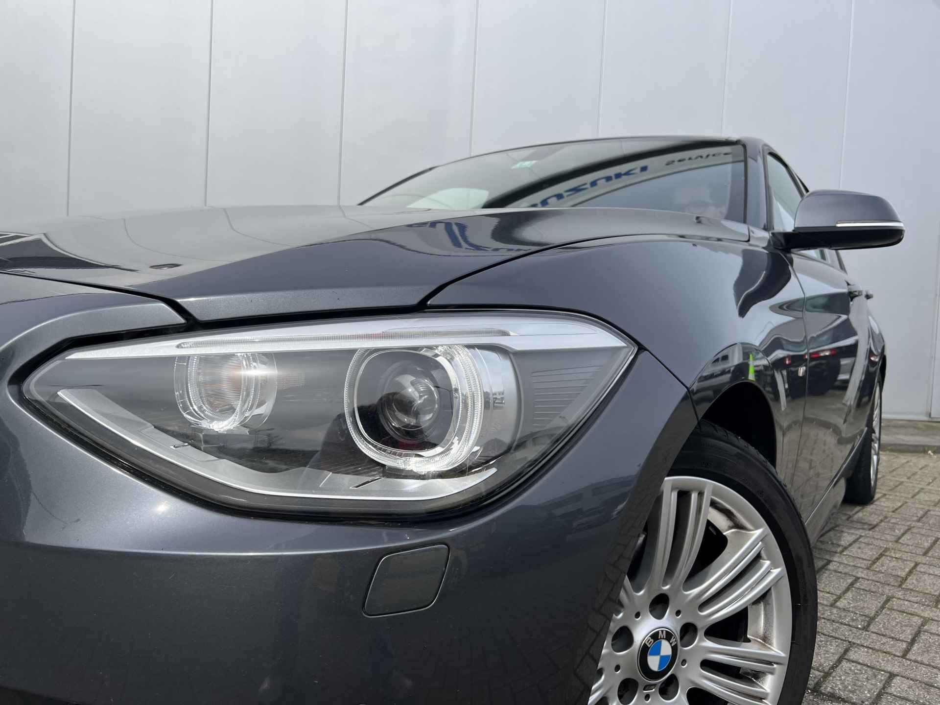 BMW 1-serie 116i High Executive Automaat | M-Pakket | Xenon Koplampen | Lederen bekleding | Stoelverwarming | 12 maanden garantie! | - 5/33
