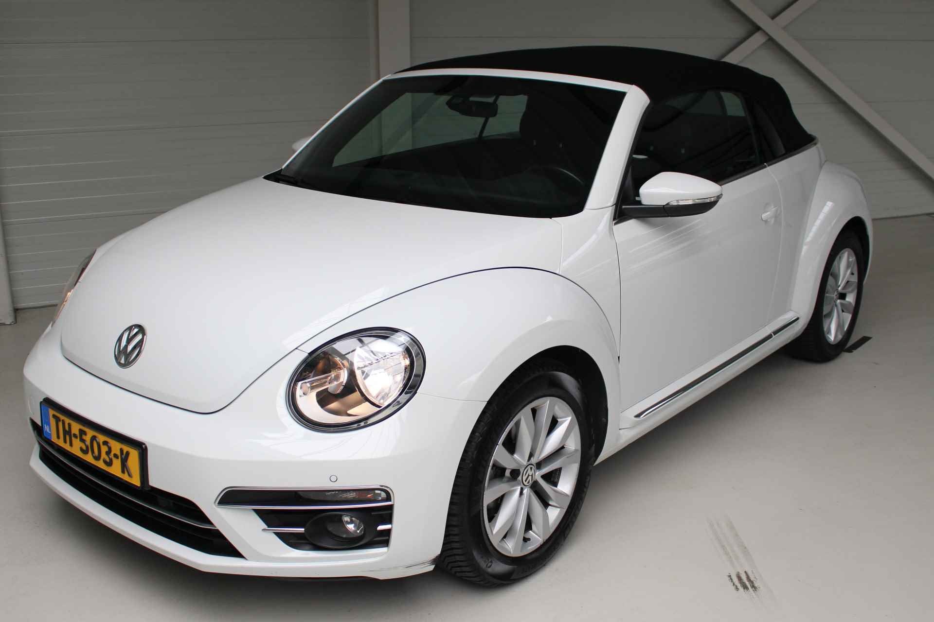 Volkswagen Beetle Cabriolet 1.4 TSI DSG SOUND Navigatie | Stoelverwarming | Parkeersensoren | All season banden . - 22/25