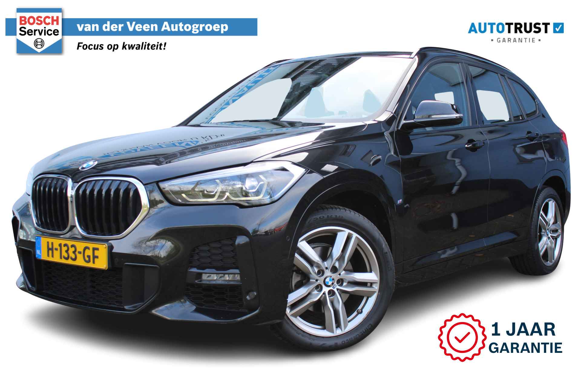 BMW X1 sDrive18i High Executive Edition M-pakket | Incl. 1 jaar Garantie | Panorama dak | Elektrische kofferbak | Climate controle | Stoelverwarming | Parkeersensoren V+A | Navigatie | Cruise controle | Lederen bekleding | Harman/Kardon audiosysteem | Head up display | Keyless start | Elektrisch schuif/kantel dak | Origineel NL auto | NAP | - 1/65