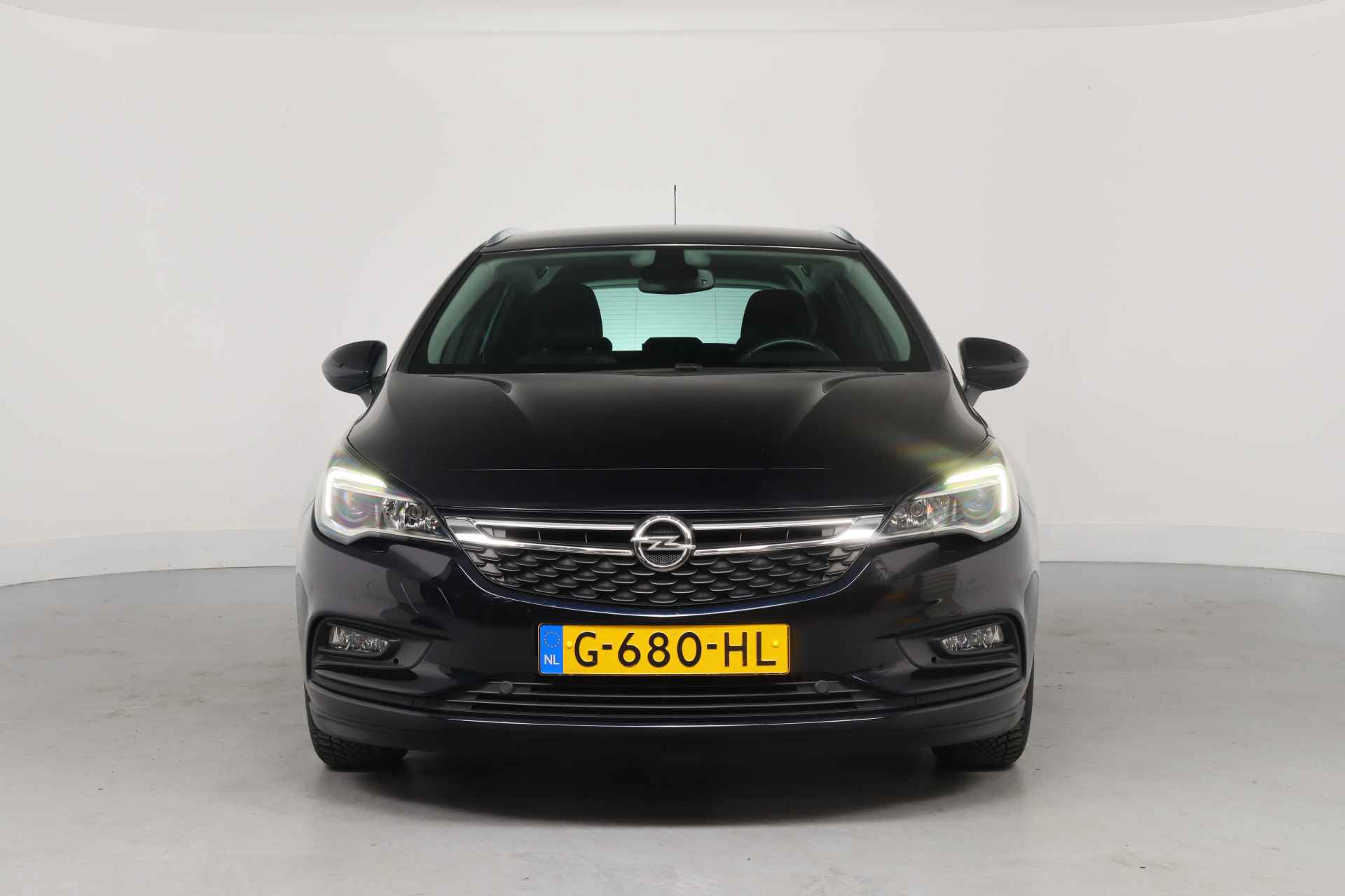 Opel Astra Sports Tourer 1.0 Turbo 120 Jaar Edition | 1e Eigenaar | AGR | Parkeersensoren V+A | Clima | Navi | DAB | Lichtmetalen Velgen - 2/35