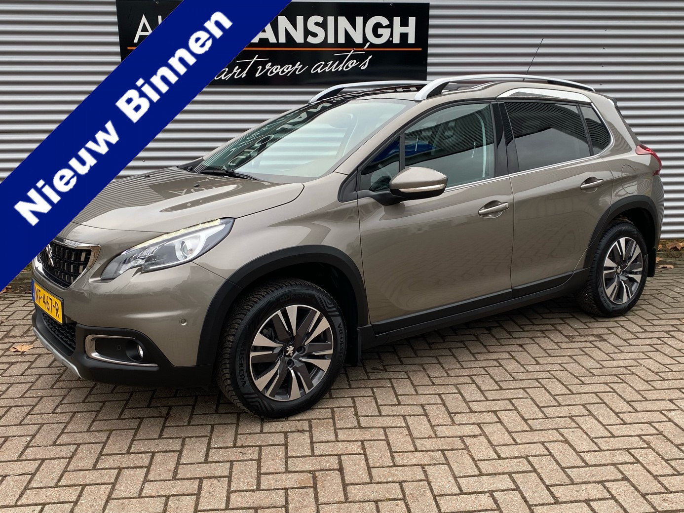 Peugeot 2008 1.2 PureTech Allure met panoramadak en 68.061km!! | Clima | Cruise | Navigatie | Lederen bekleding | LM velgen | Unieke km stand | Ndl auto | RIJKLAARPRIJS INCL 12 MAANDEN GARANTIE EN BEURT