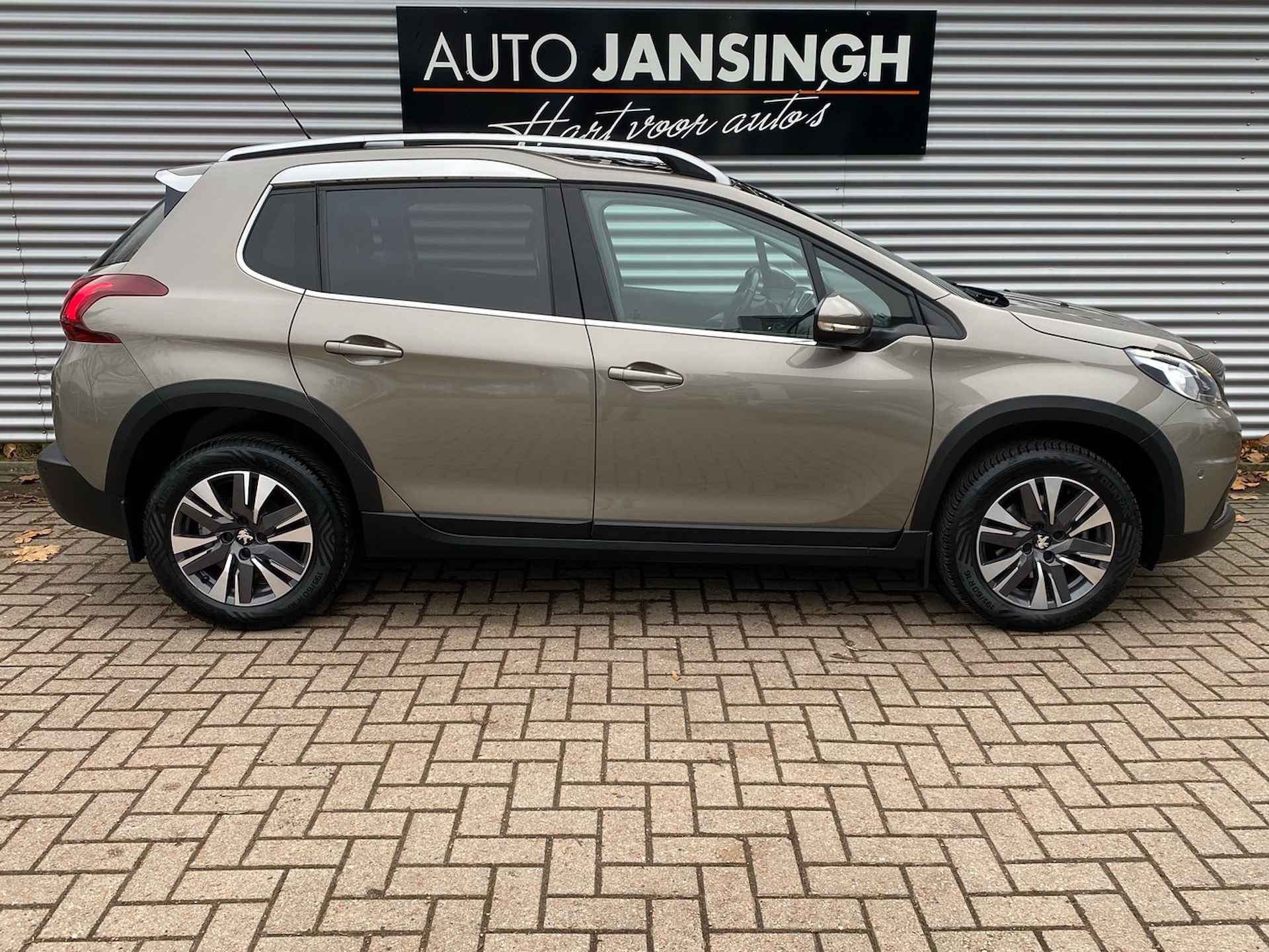 Peugeot 2008 1.2 PureTech Allure met panoramadak en 68.061km!! | Clima | Cruise | Navigatie | Lederen bekleding | LM velgen | Unieke km stand | Ndl auto | RIJKLAARPRIJS INCL 12 MAANDEN GARANTIE EN BEURT - 5/29