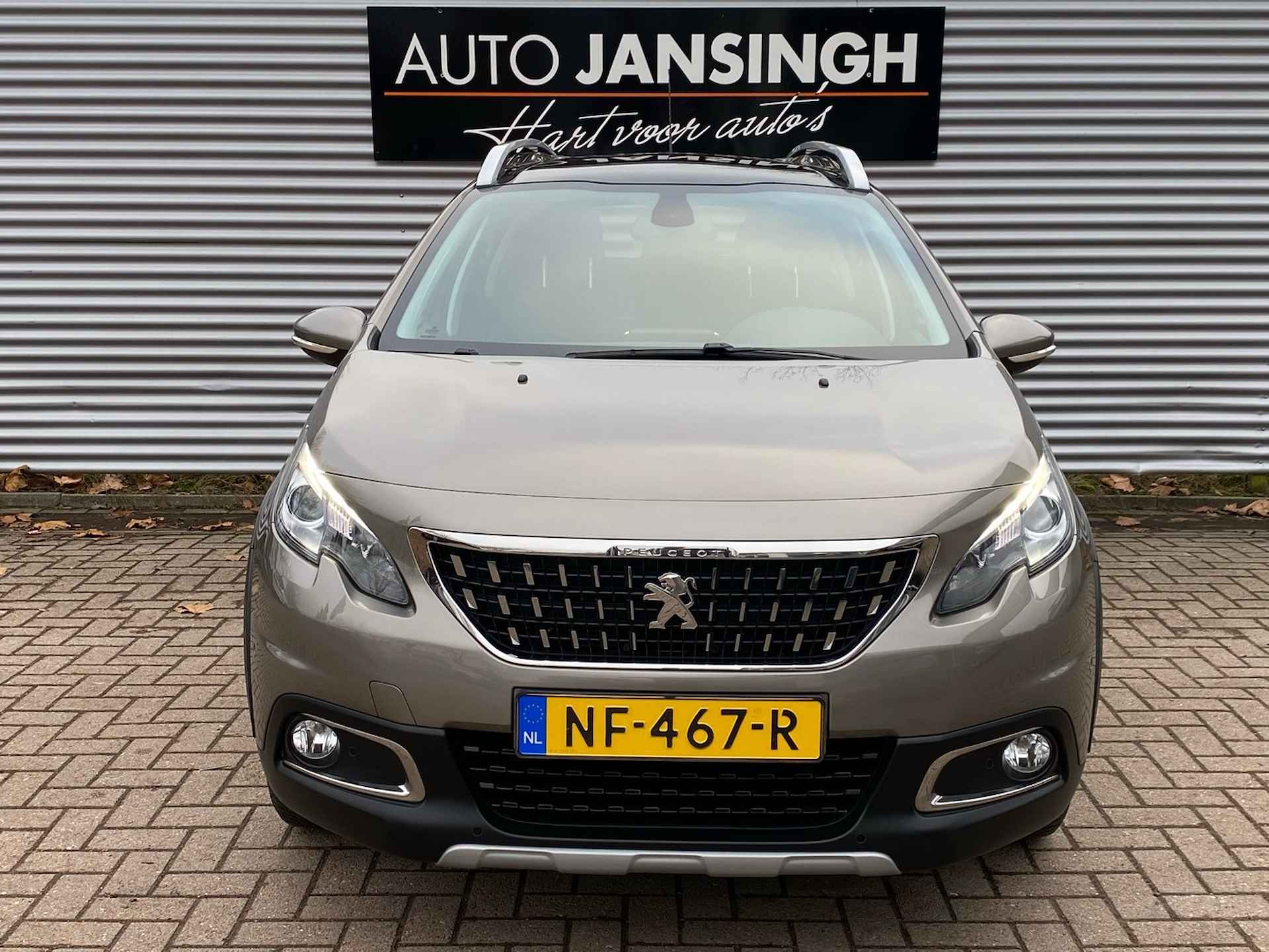 Peugeot 2008 1.2 PureTech Allure met panoramadak en 68.061km!! | Clima | Cruise | Navigatie | Lederen bekleding | LM velgen | Unieke km stand | Ndl auto | RIJKLAARPRIJS INCL 12 MAANDEN GARANTIE EN BEURT - 6/29