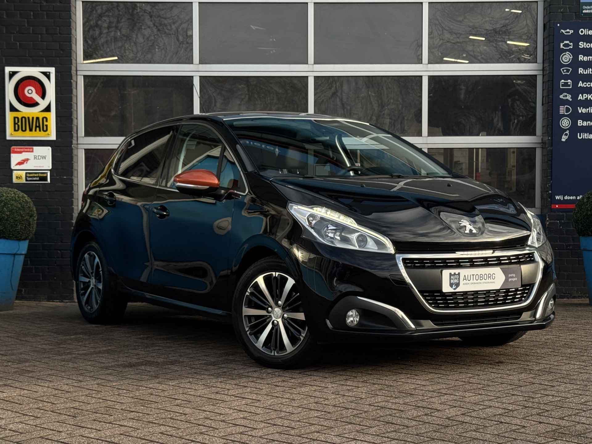 Peugeot 208 1.2 PureTech Roland Garros | Panoramadak | Cruise Control | Rijklaar + 12 Maand BOVAG Garantie - 52/57