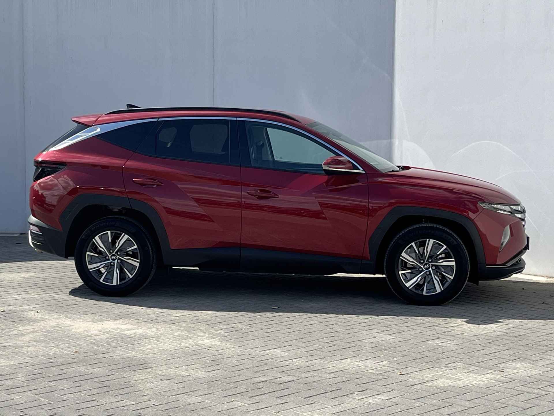 Hyundai Tucson 1.6 T-GDI 230pk HEV Comfort / Navigatie / Climate control / Dodehoekdetectie / Stoelverwarming / Cruise control / Apple carplay & Android auto / 1650kg Trekgewicht / - 22/52