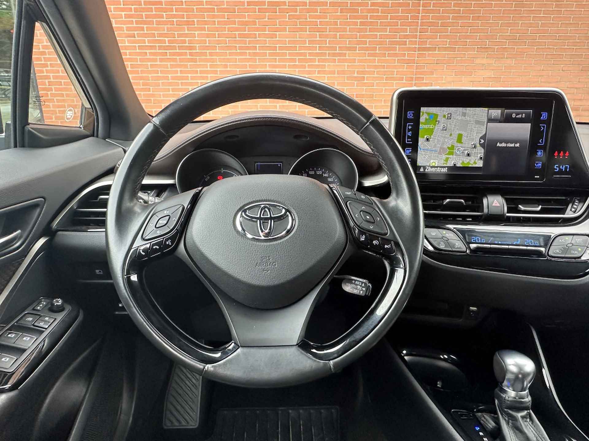 Toyota C-HR 1.8 Hybride Style Ultimate Full Led Navigatie Clima - 7/37