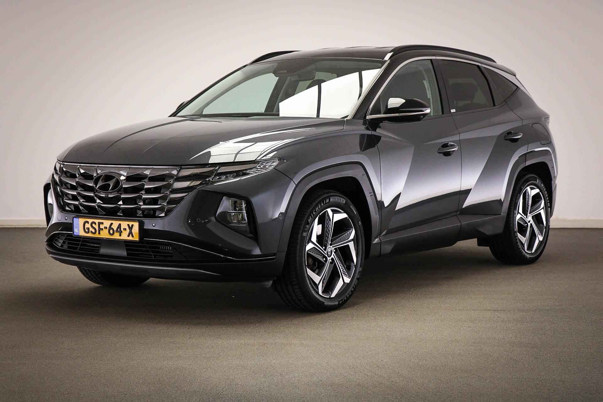 Hyundai Tucson 1.6 T-GDI PHEV Premium 4WD | STUURVERWARMING | STOELKOELKING | 360 CAMERA | DEALER ONDERHOUDEN - 58/59