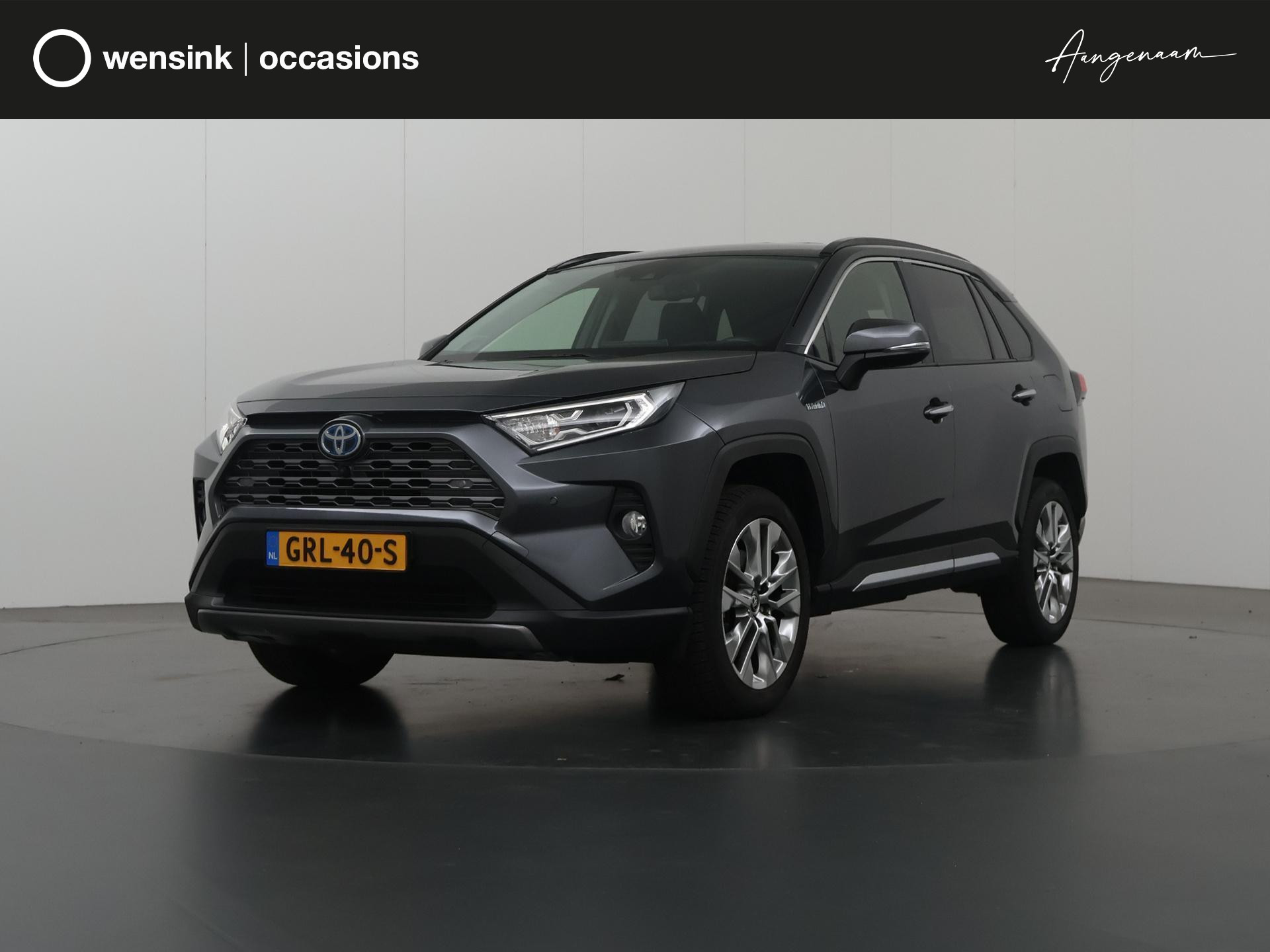 Toyota RAV4 2.5 Hybrid AWD Bi-Tone  Keyless go | Navigatie | Airco | JBL Audio | Apple CarPlay | Lederen Interieur | Stoelverwarming | Ele. stoelen + Geheugen |