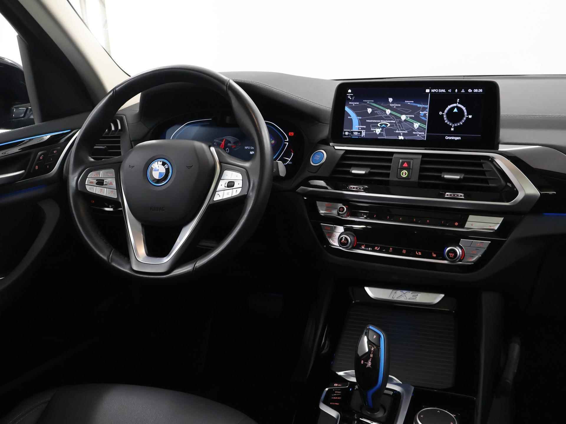 BMW iX3 Executive 80 kWh | Elektrisch verstelbare stoelen + geheugen | Digitaal Dashboard | Camera | Apple CarPlay | Navigatie | Stoelverwarming | Standkachel | Panoramadak | Adaptieve Cruise Control | Trekhaak | - 10/49