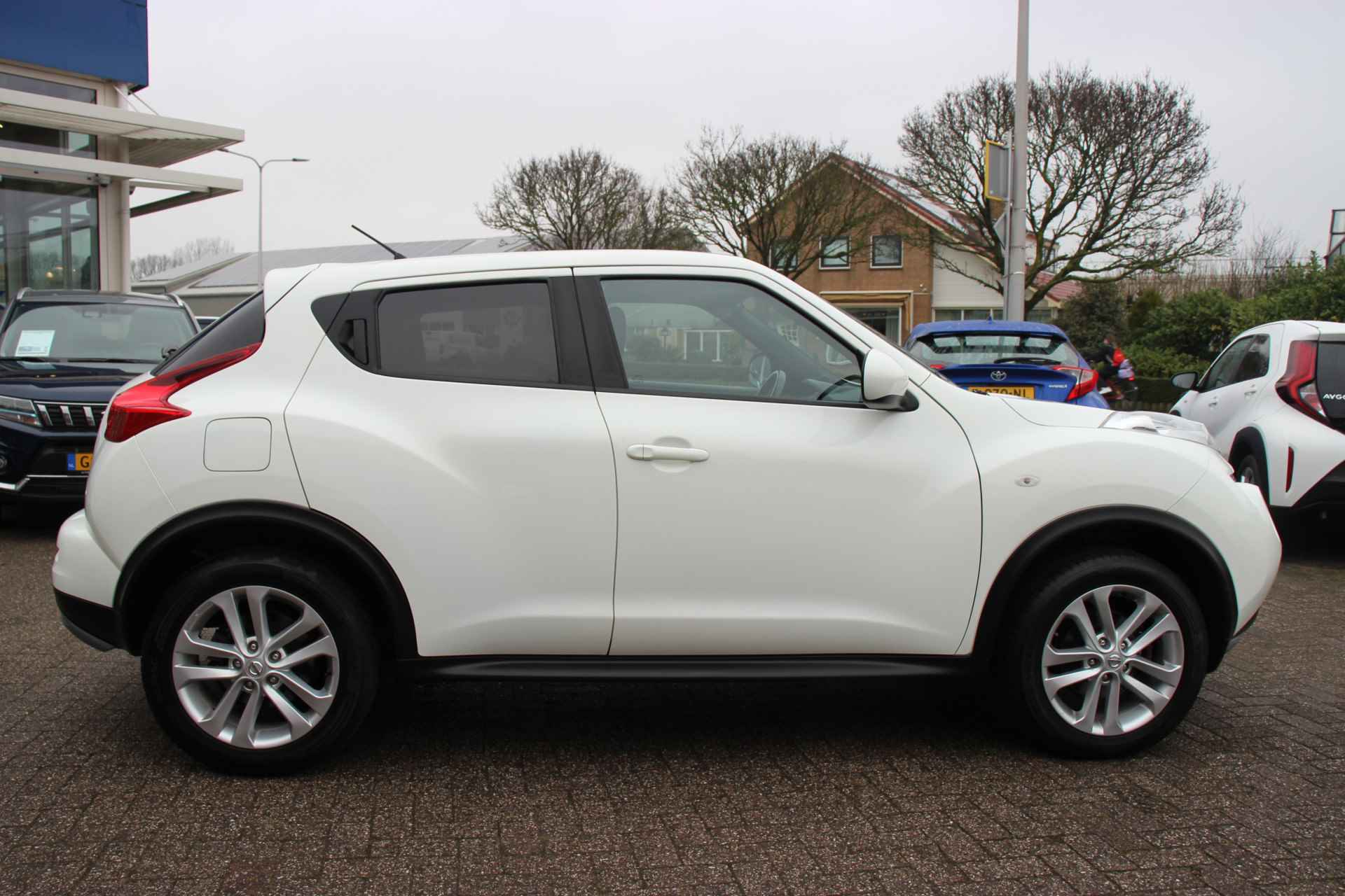 Nissan Juke 1.6 Acenta | Trekhaak | Clima | Cruise | - 12/26