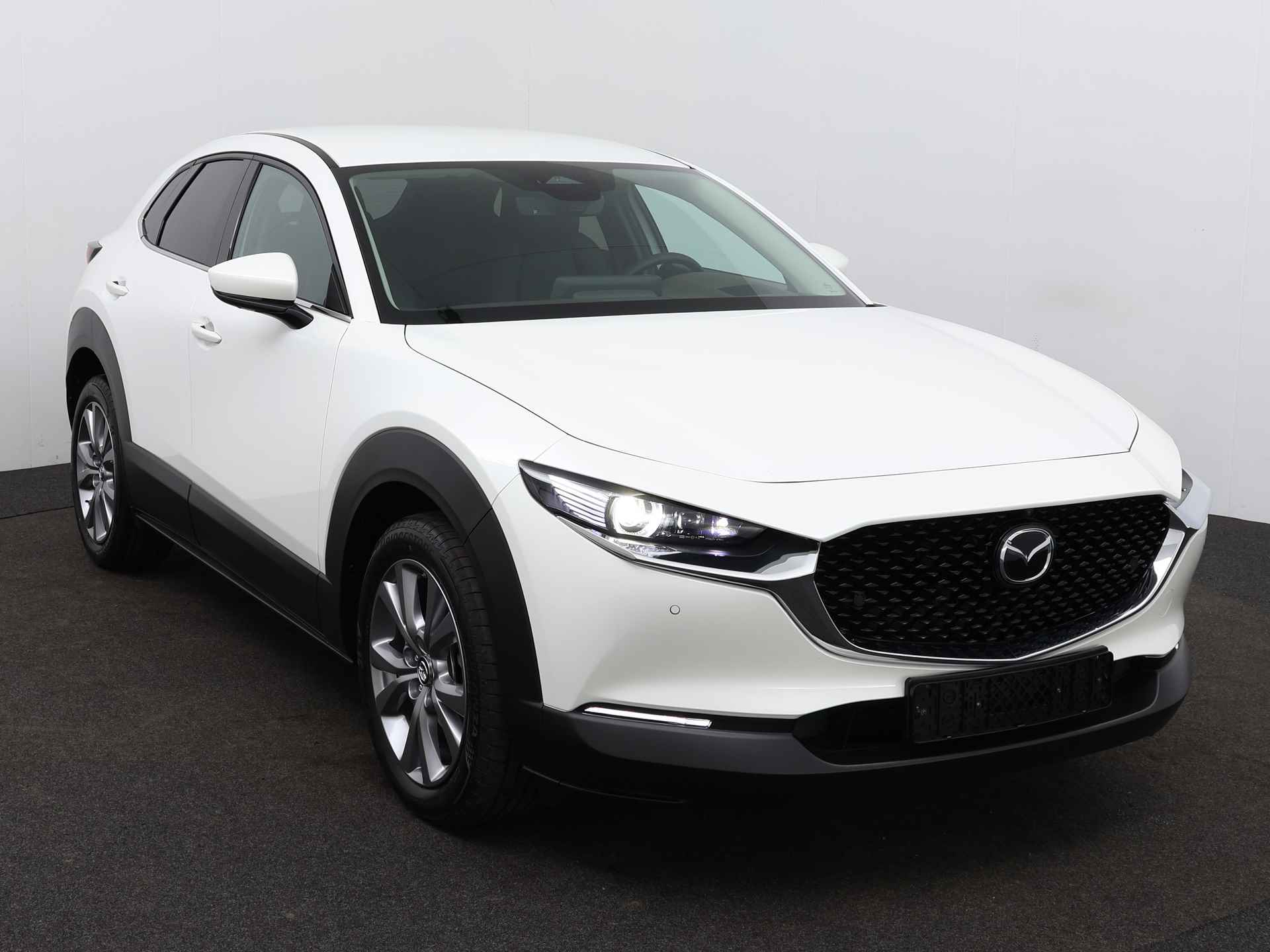 Mazda CX-30 2.0 e-SkyActiv-G M Hybrid Exclusive-line COMB DASO DESI | Incl. € 3.500,- instapvoordeel | Direct uit voorraad leverbaar in diverse kleuren en uitvoeringen - 23/35