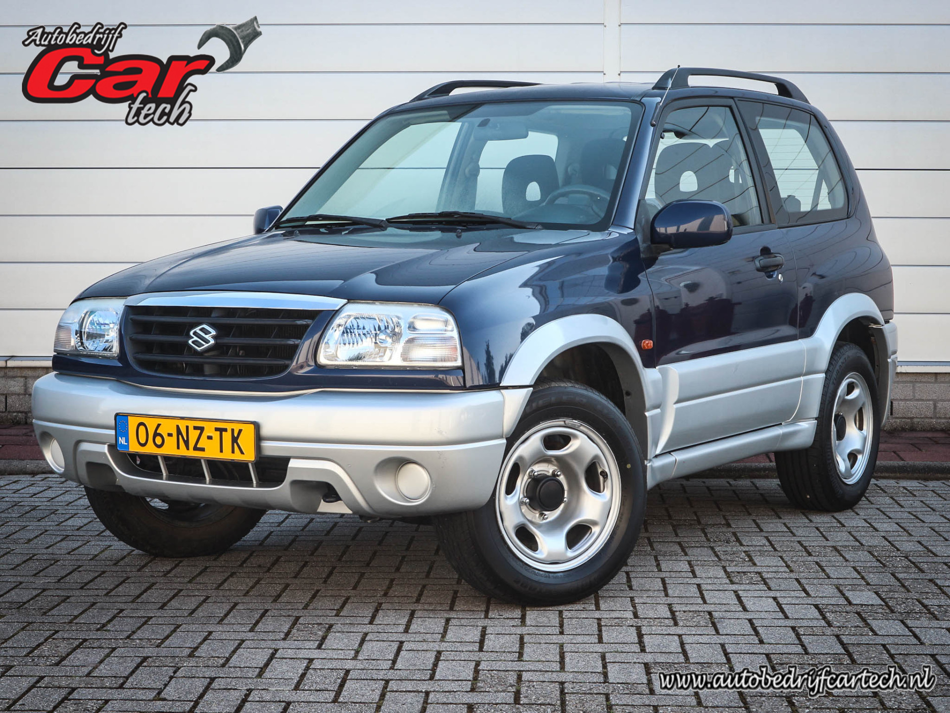 Suzuki Grand Vitara 1.6 Metal Top Wide Body | Audio | Elektrische ramen | Two tone kleur | Centrale vergrendeling |