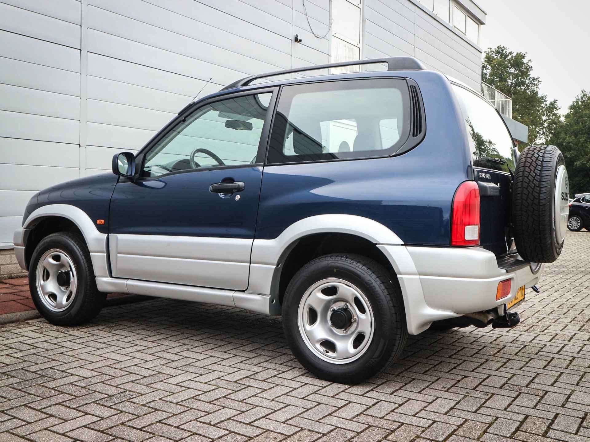 Suzuki Grand Vitara 1.6 Metal Top Wide Body | Audio | Elektrische ramen | Two tone kleur | Centrale vergrendeling | - 27/41