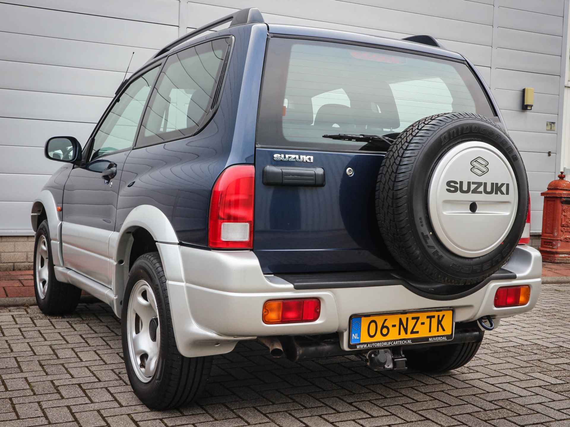 Suzuki Grand Vitara 1.6 Metal Top Wide Body | Audio | Elektrische ramen | Two tone kleur | Centrale vergrendeling | - 28/41