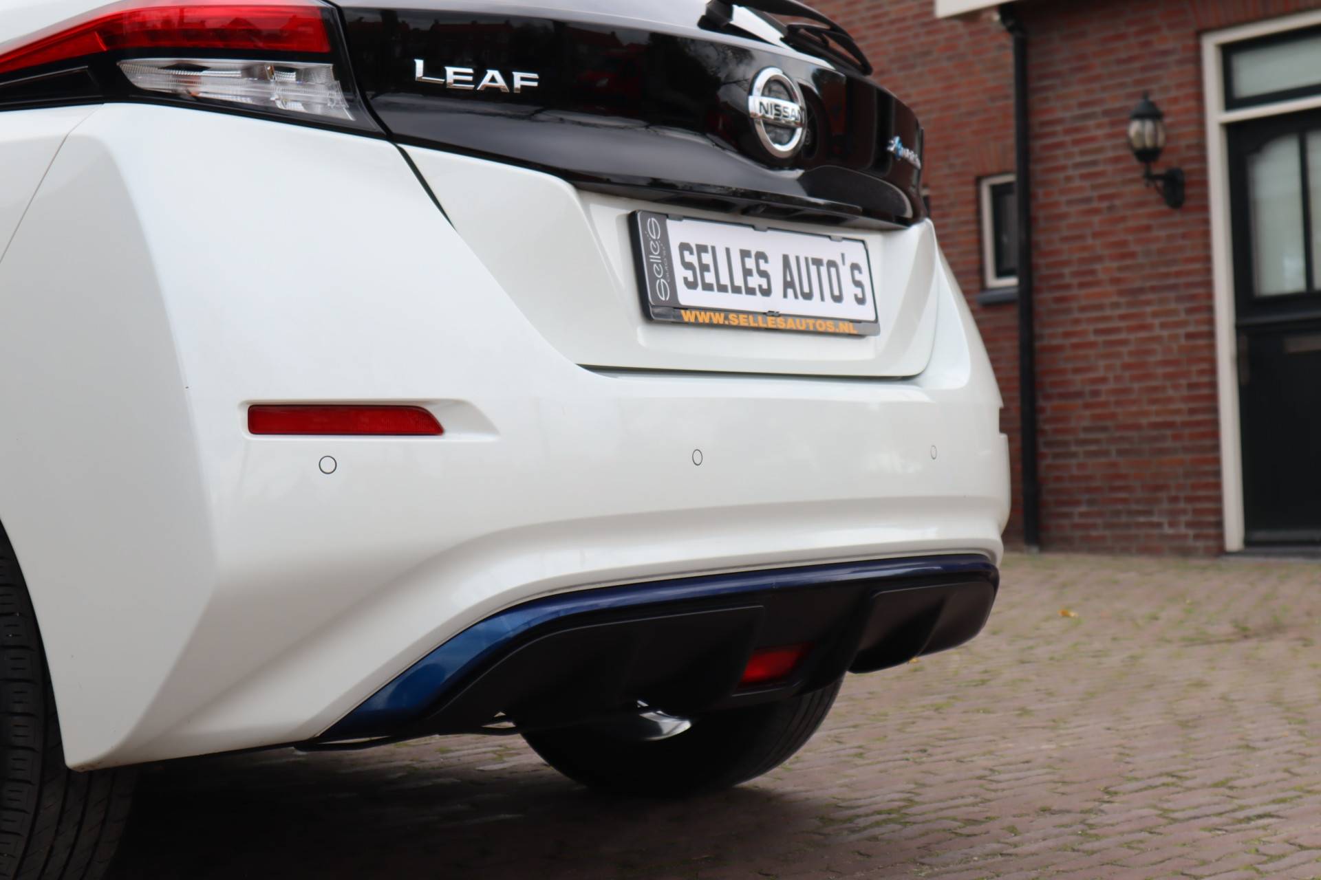 Nissan Leaf Tekna 40 kWh | 360 Camera | Parelmoer | Lederen Bekleding | Apple Carplay | Zwart Dak - 33/46