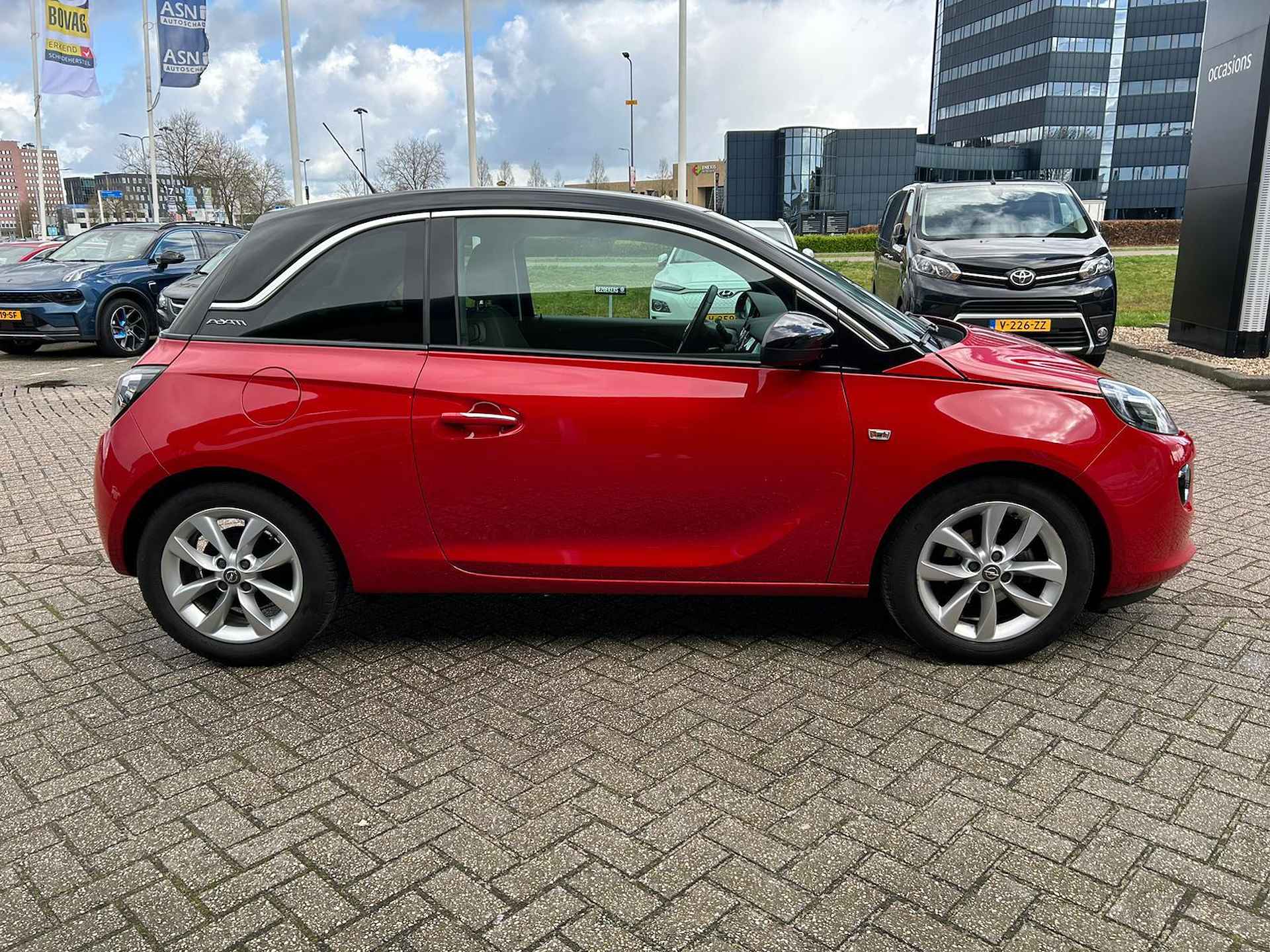 Opel ADAM 1.0 Turbo Unlimited | Rijklaarprijs! | Airconditioning | Cruise Control | LM velgen | Two Tone Black Red | Inclusief 12 mnd BOVAG-Garantie! | - 18/23