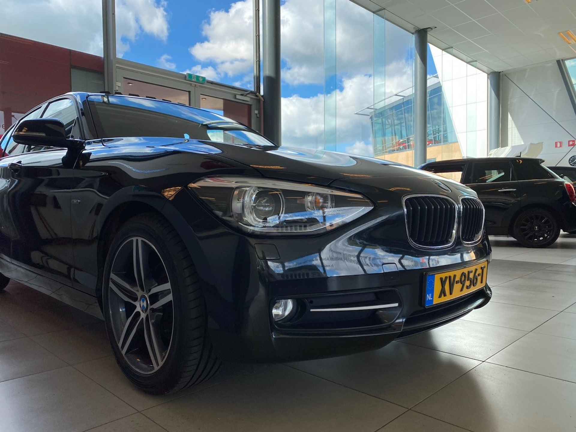 BMW 1-serie 116i High Executive,Automaat,Panoramadak,Navigatie,Parkeerassistent,Achtersensoren,Comfortstoelen met Stoelverwarming,Climate&Cr - 7/27