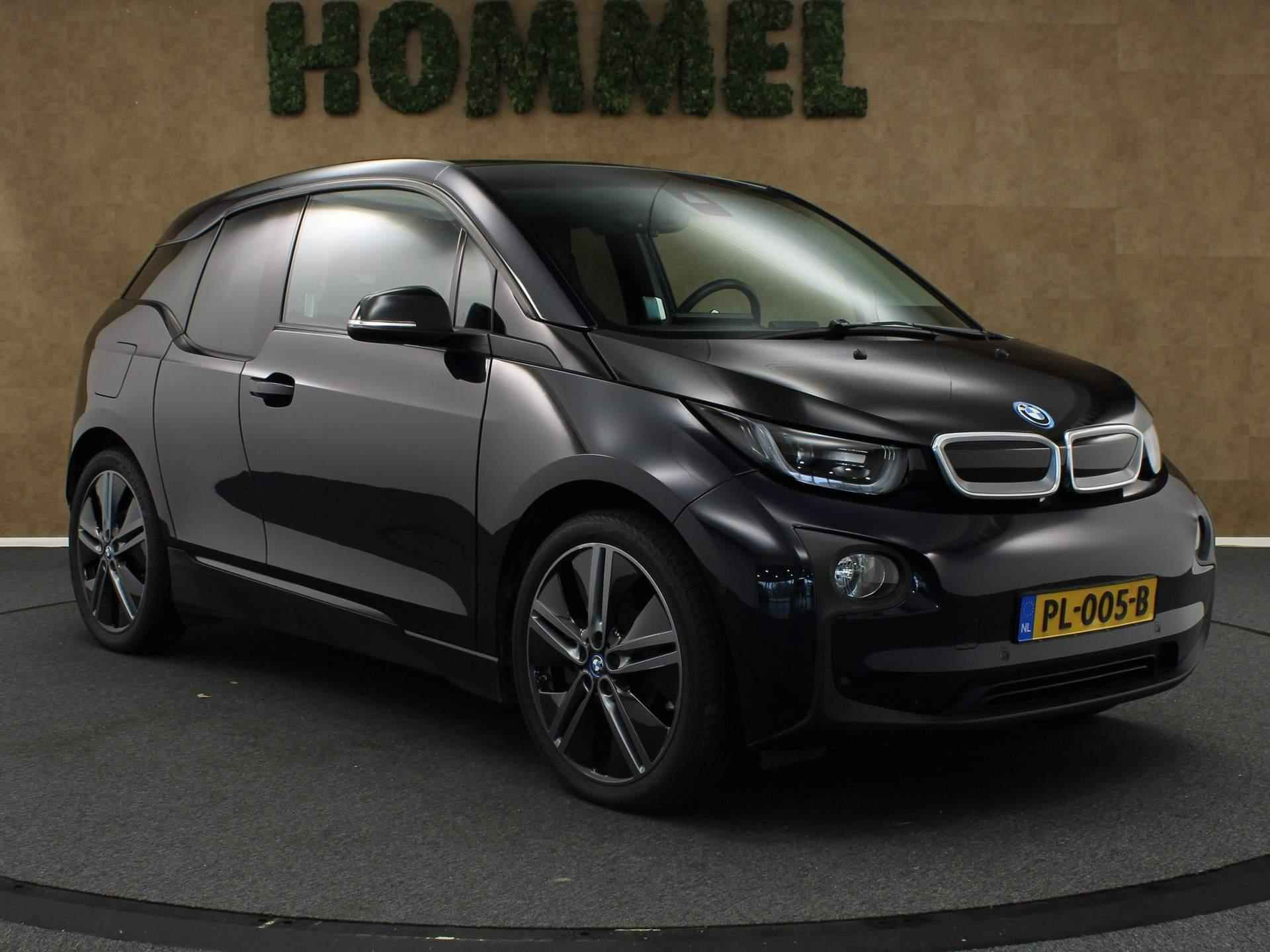 BMW i3 Basis 94Ah 33 kWh - ORIGINEEL NEDERLANDSE AUTO - CRUISE CONTROL - NAVIGATIESYSTEEM - LEDEREN BEKLEDING - ACHTERRUITRIJCAMERA - MULTIMEDIAVOORBEREIDING - HOUTEN AFWERKING - 10/40