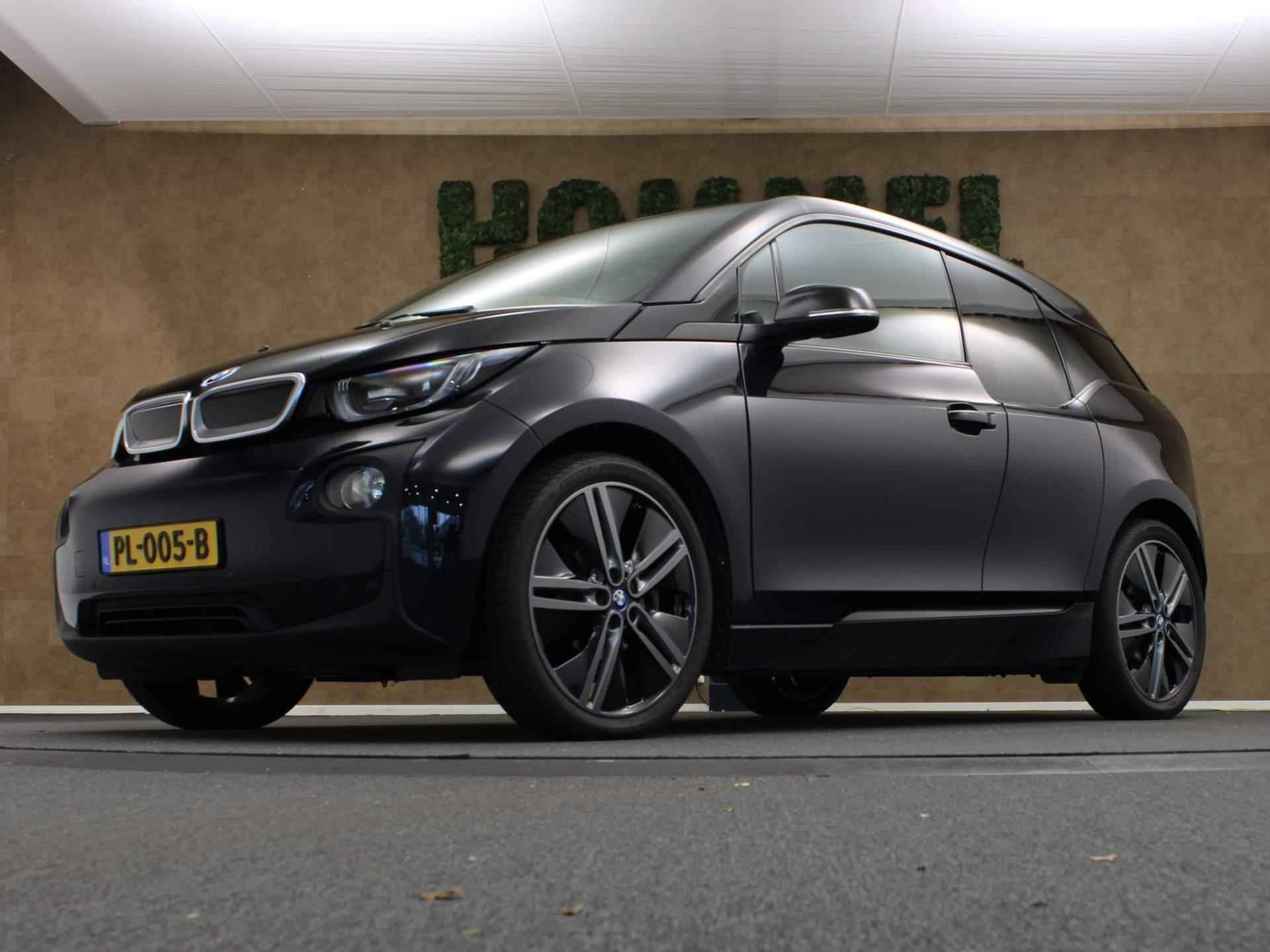 BMW i3 Basis 94Ah 33 kWh - ORIGINEEL NEDERLANDSE AUTO - CRUISE CONTROL - NAVIGATIESYSTEEM - LEDEREN BEKLEDING - ACHTERRUITRIJCAMERA - MULTIMEDIAVOORBEREIDING - HOUTEN AFWERKING - 13/40