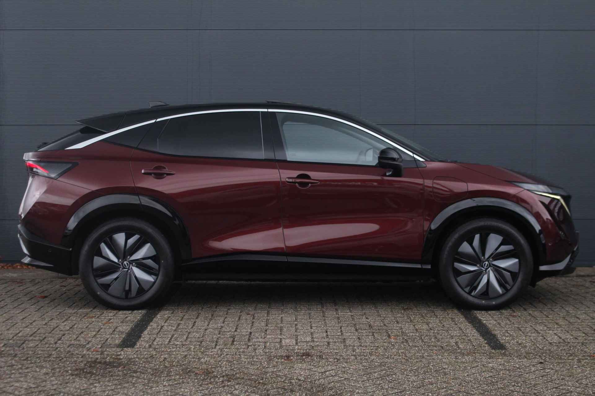 Nissan Ariya Evolve 91 kWh 240pk | Bose Audio | Draadloze Apple Carplay & Android Auto | Afneembare Trekhaak | Elektrisch Verstelbare Stoelen | Stoel/Stuurwiel Verwarming | Nieuw! - 5/42