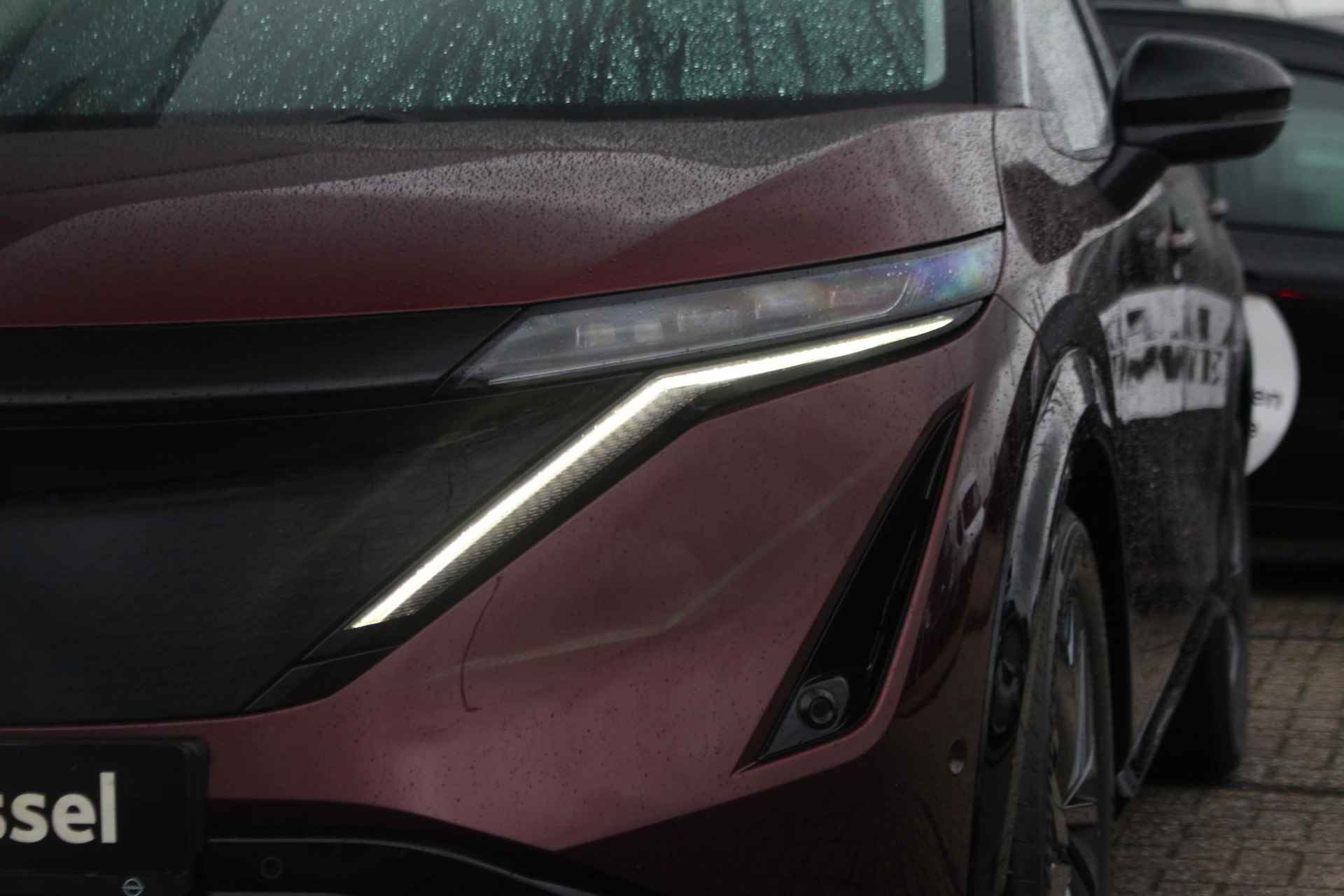 Nissan Ariya Evolve 91 kWh 240pk | Bose Audio | Draadloze Apple Carplay & Android Auto | Afneembare Trekhaak | Elektrisch Verstelbare Stoelen | Stoel/Stuurwiel Verwarming | Nieuw! - 12/42