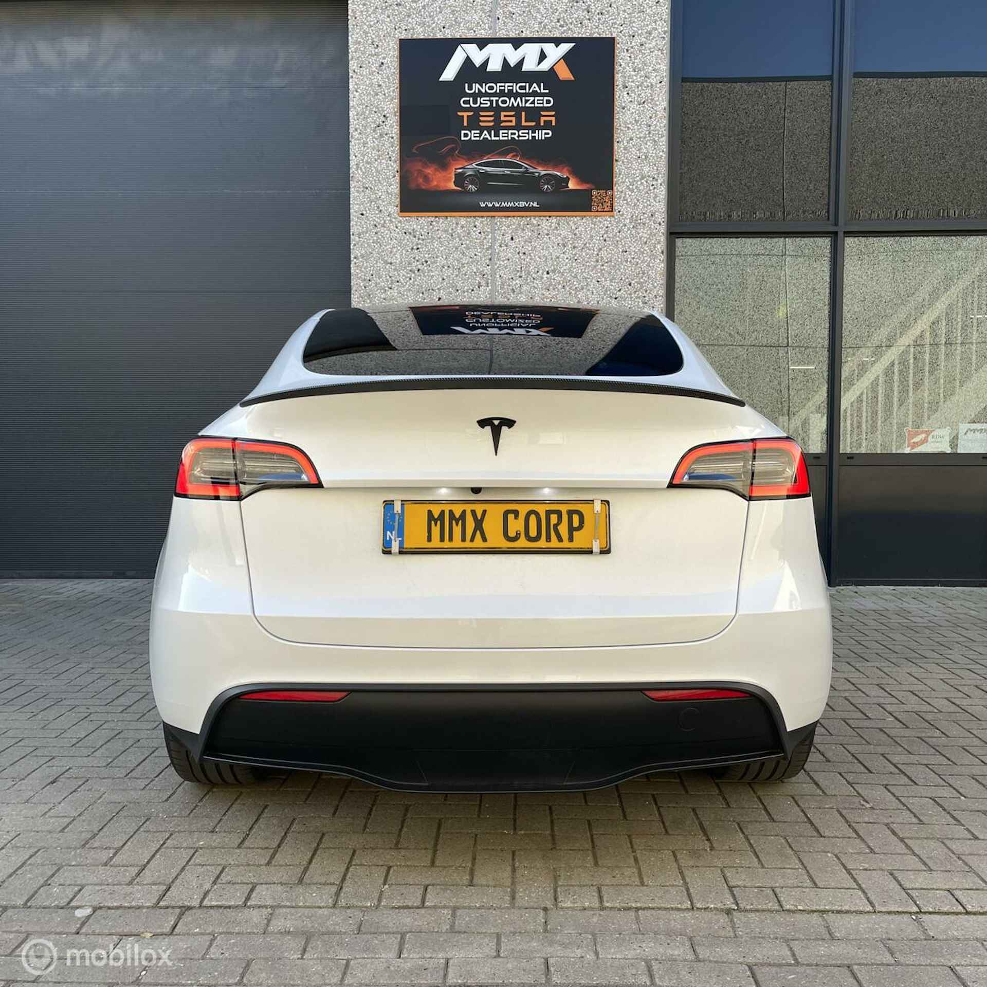 Tesla Model Y RWD 60kWh met NIEUWE BATTERIJ MMX PACK - 8/23