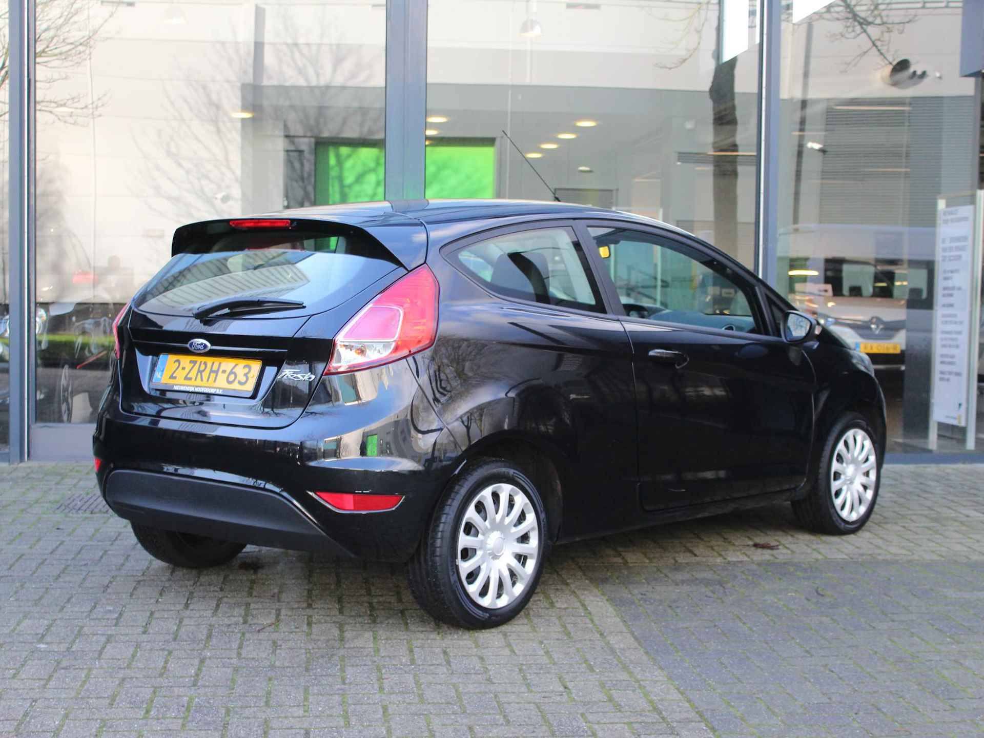 Ford Fiesta 65 Style / NAVI / AIRCO / BLUETOOTH / DEALER ONDERHOUDEN / 15'' - 4/34