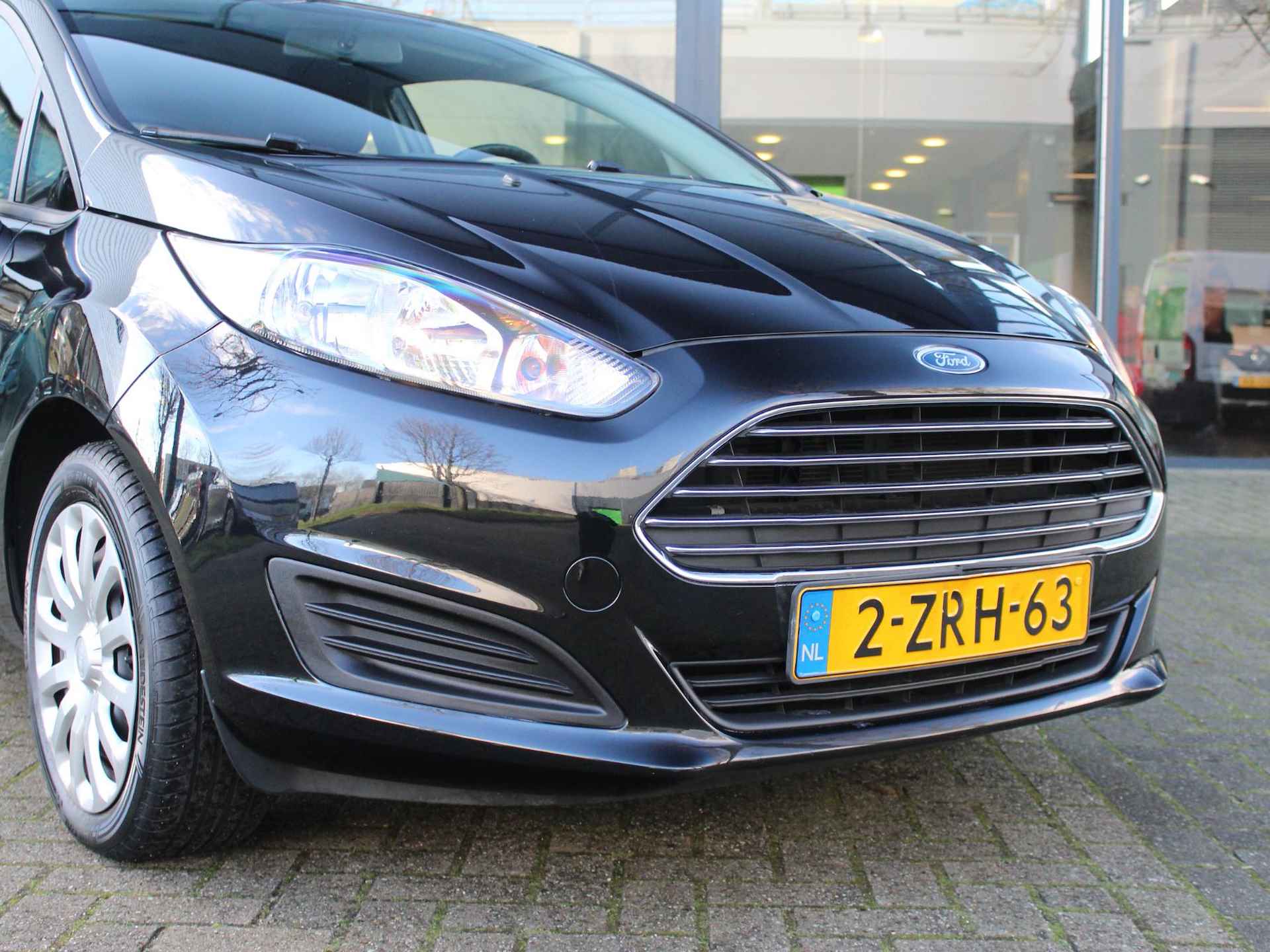 Ford Fiesta 65 Style / NAVI / AIRCO / BLUETOOTH / DEALER ONDERHOUDEN / 15'' - 9/34