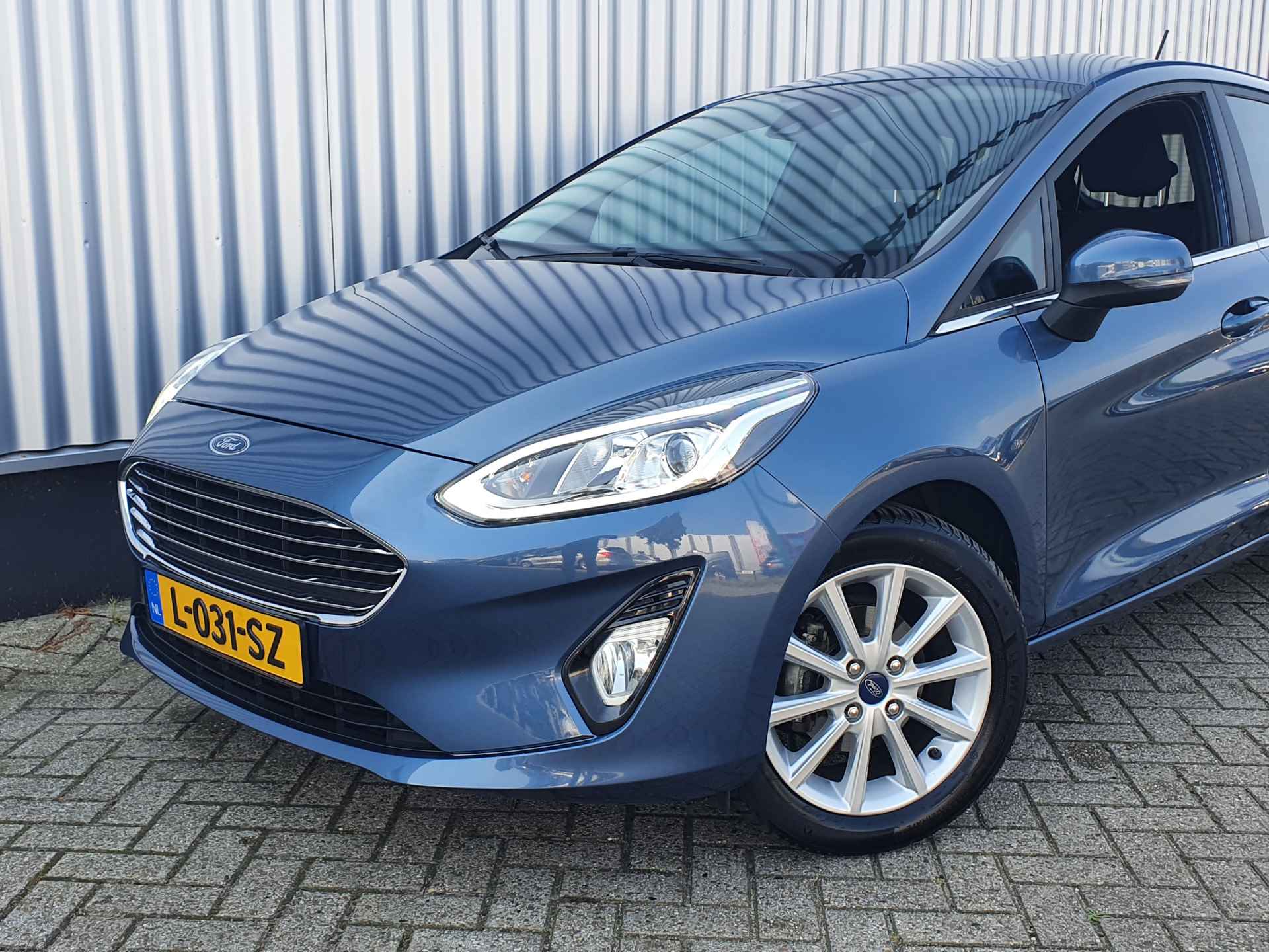 Ford Fiesta 1.0 EcoBoost Titanium | Winter Pack | Navigatie | Apple Carplay | Cruise Control - 4/25