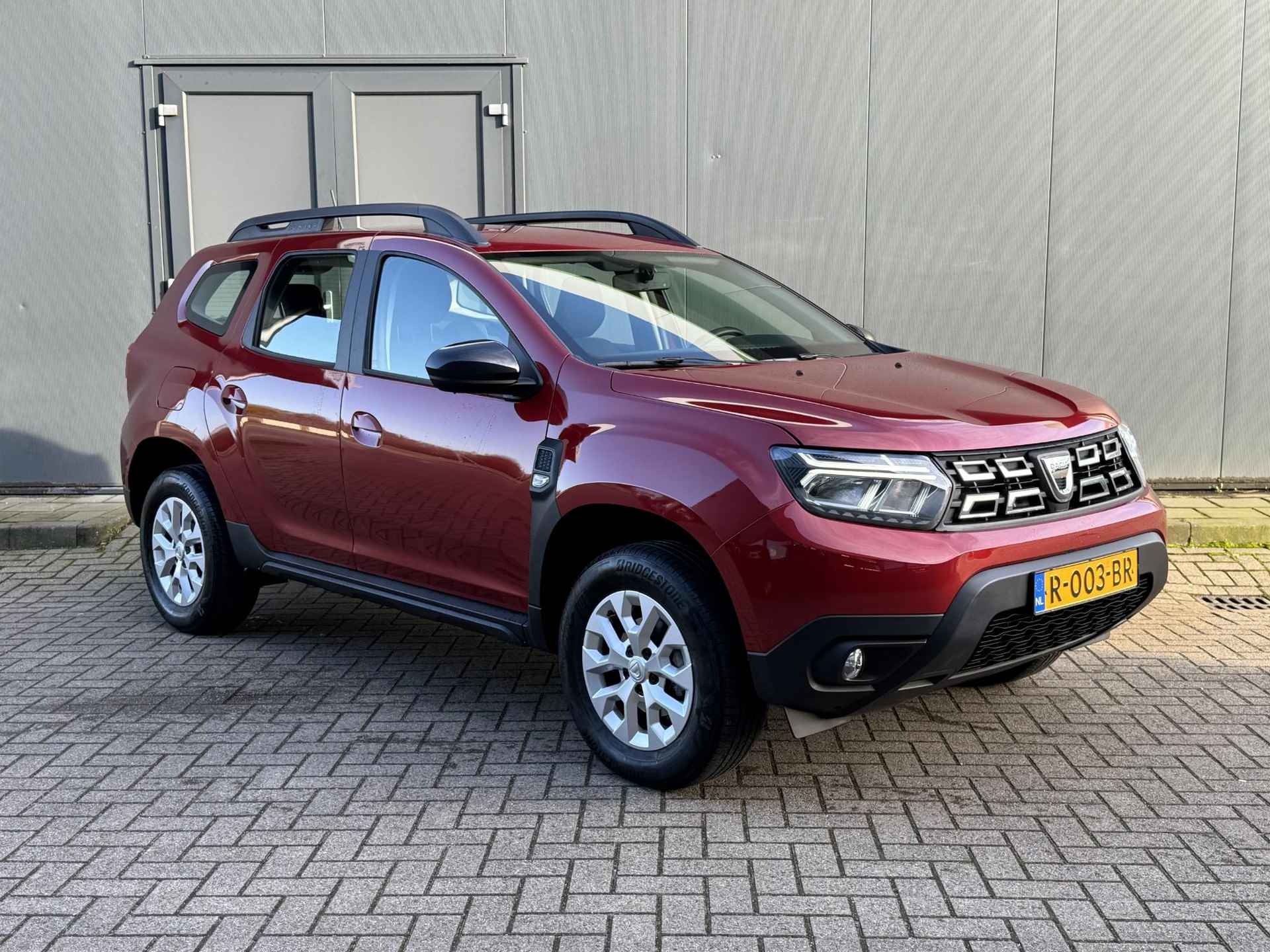 Dacia Duster 1.0 TCe Bi-Fuel Comfort / Trekhaak / Airco / Cruise Control / Apple&Android Carplay / Bluetooth / DAB / Sensoren Achter - 18/37