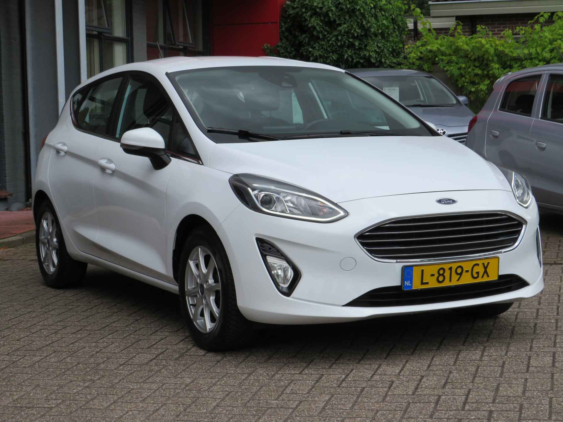 Ford Fiesta 1.0 EcoBoost Hybrid Titanium| 125-PK| | Clima-Airco | Android Auto | Parkeersensoren | Incl. BOVAG Garantie | DAB+ | Navigatiesysteem | Bluetooth | - 4/38