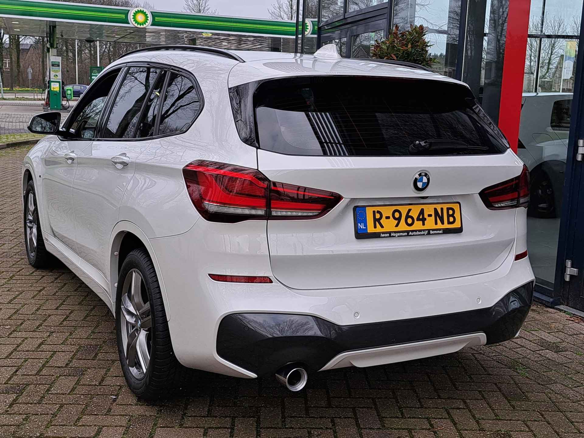 BMW X1 sDrive18i M AUTOMAAT | Navi | ECC | PDC + Camera | Cruise Control | LM Velgen - 5/28