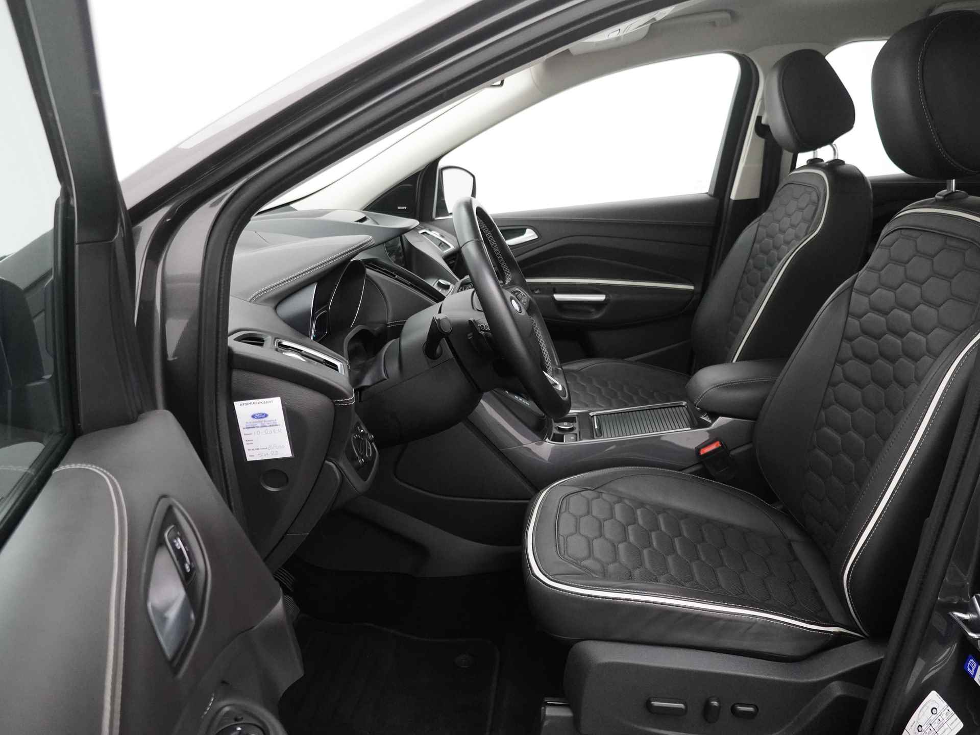 Ford Kuga 1.5 EcoBoost 182 pk Vignale | Trekhaak | Winter Pack | El. a. klep | Xenon | Camera | Leer | 100% dealer onderh. - 11/21