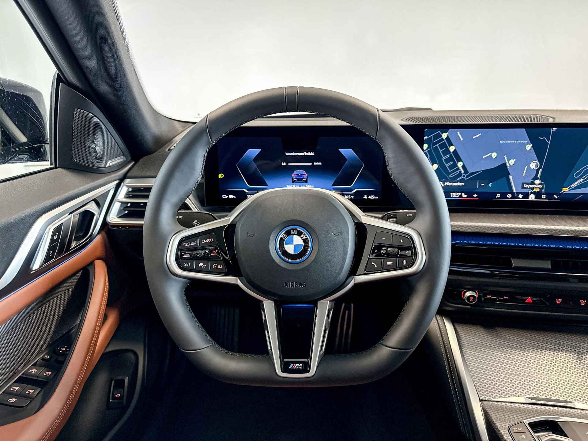 BMW i4 eDrive40 84 kWh | M Sport | Glazen Panoramadak | Harman Kardon | Stoelverwarming | Trekhaak | - 12/28