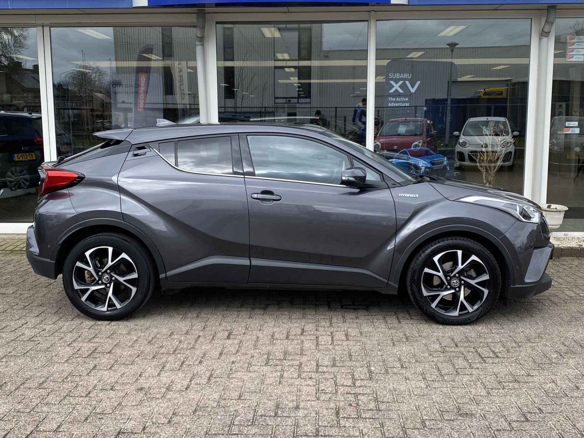 Toyota C-HR 1.8 Hybrid Business Intro | Adaptieve Cruise Control | Stoelverwarming voor | Achteruitrijcamera | Navigatie | Parkeersensoren voor + achter | - 27/34