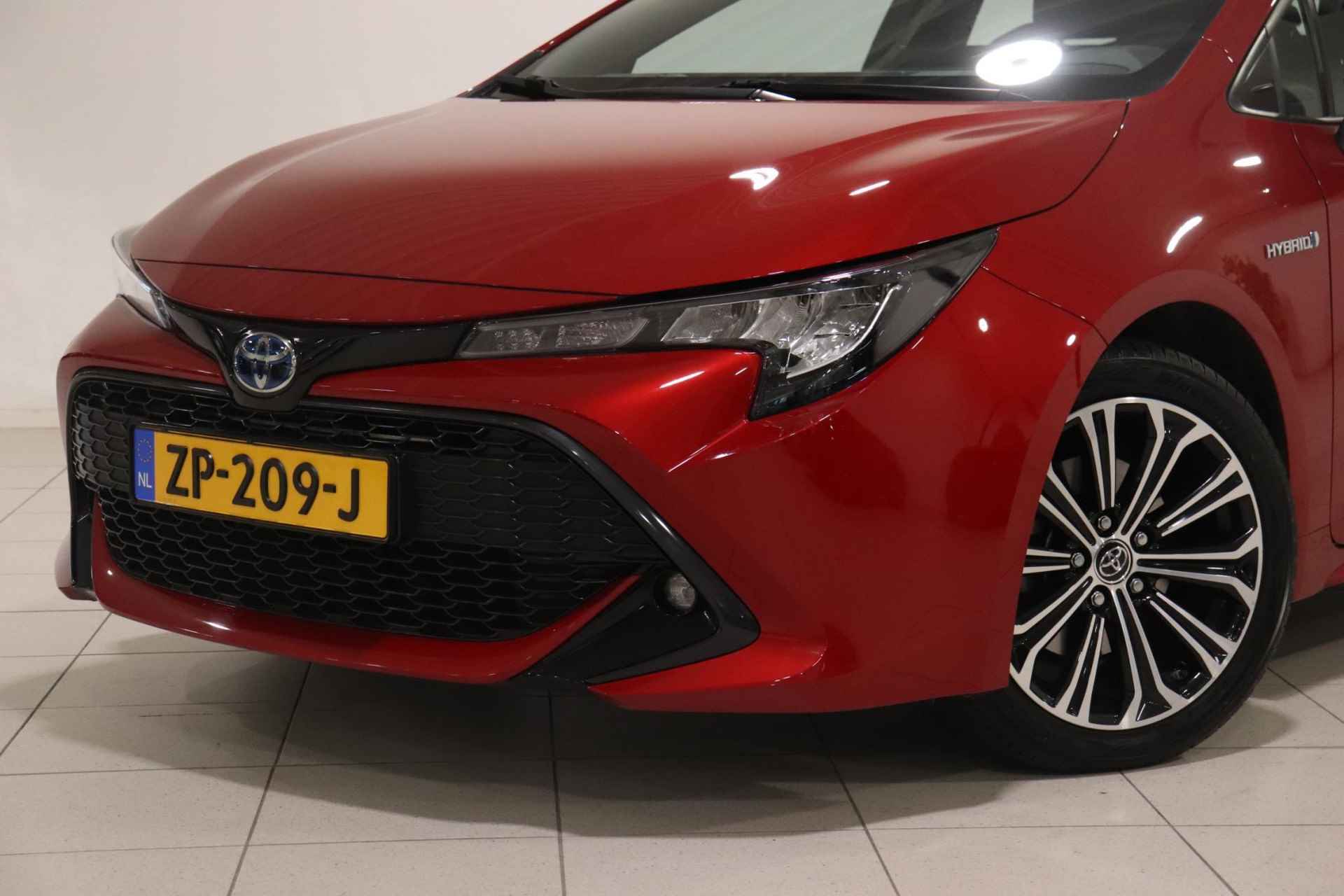 Toyota Corolla 2.0 Hybrid First Edition NAVI, Zwart dak, 184PK, 17" inch LM velgen, Dealer onderhouden! - 7/34