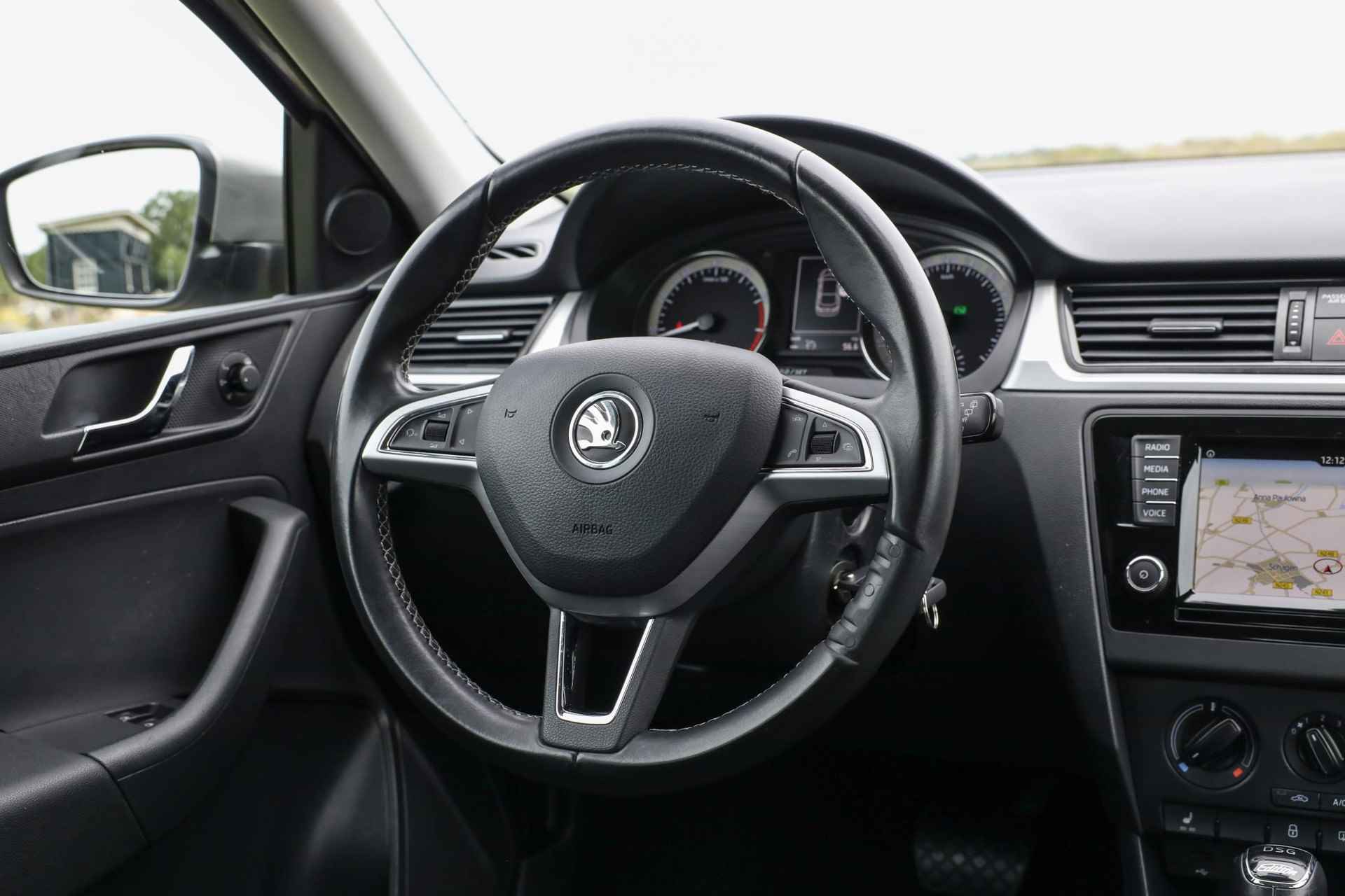 Skoda Rapid 1.2 TSI Aut7 Edition ✅ Navi ✅ Stoelverwarming ✅ Trekhaak - 17/33